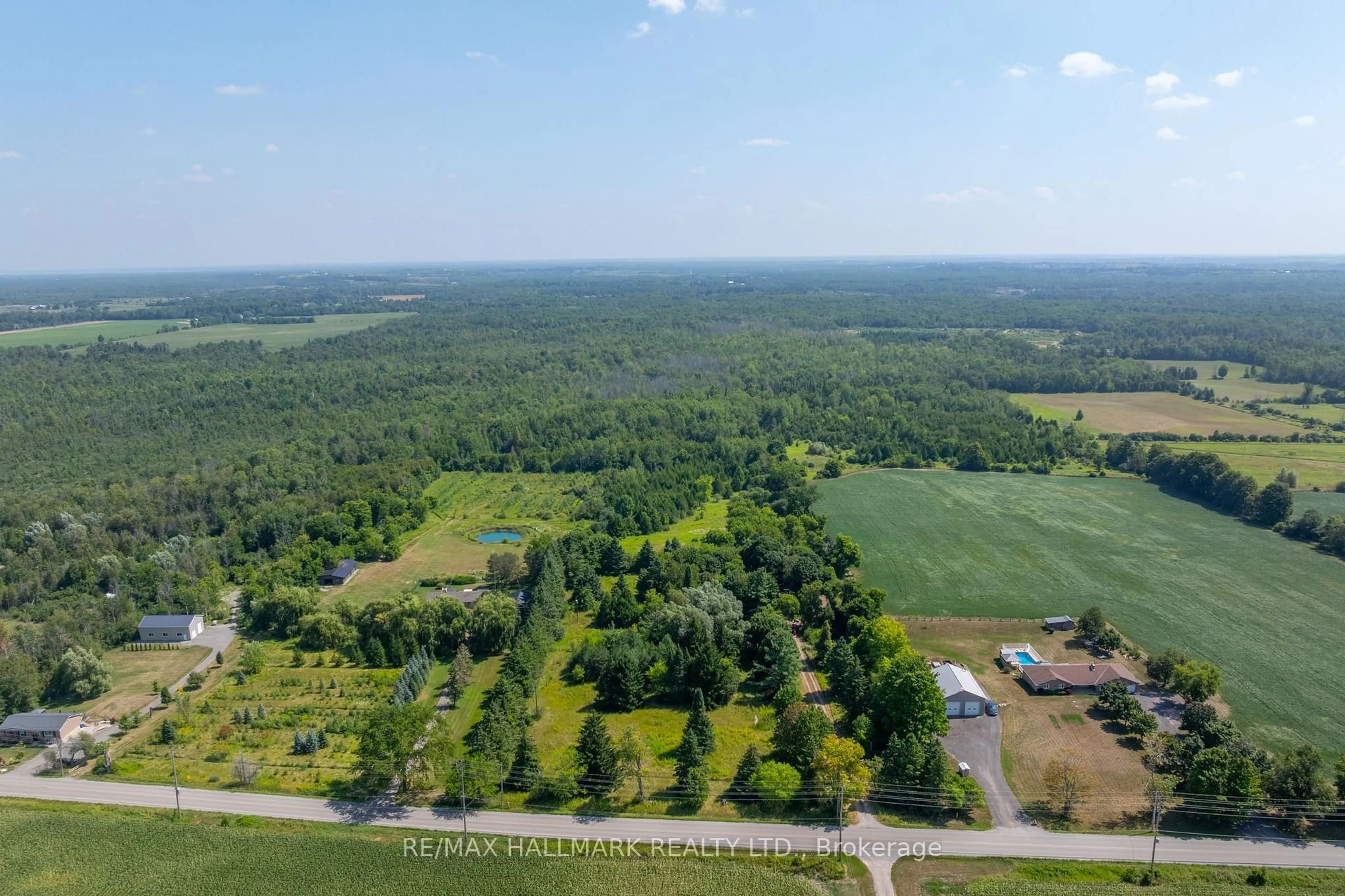 A pic from outside/outdoor area/front of a property/back of a property/a pic from drone, forest/trees view for 23895 Mccowan Rd, Georgina Ontario L0E 1R0