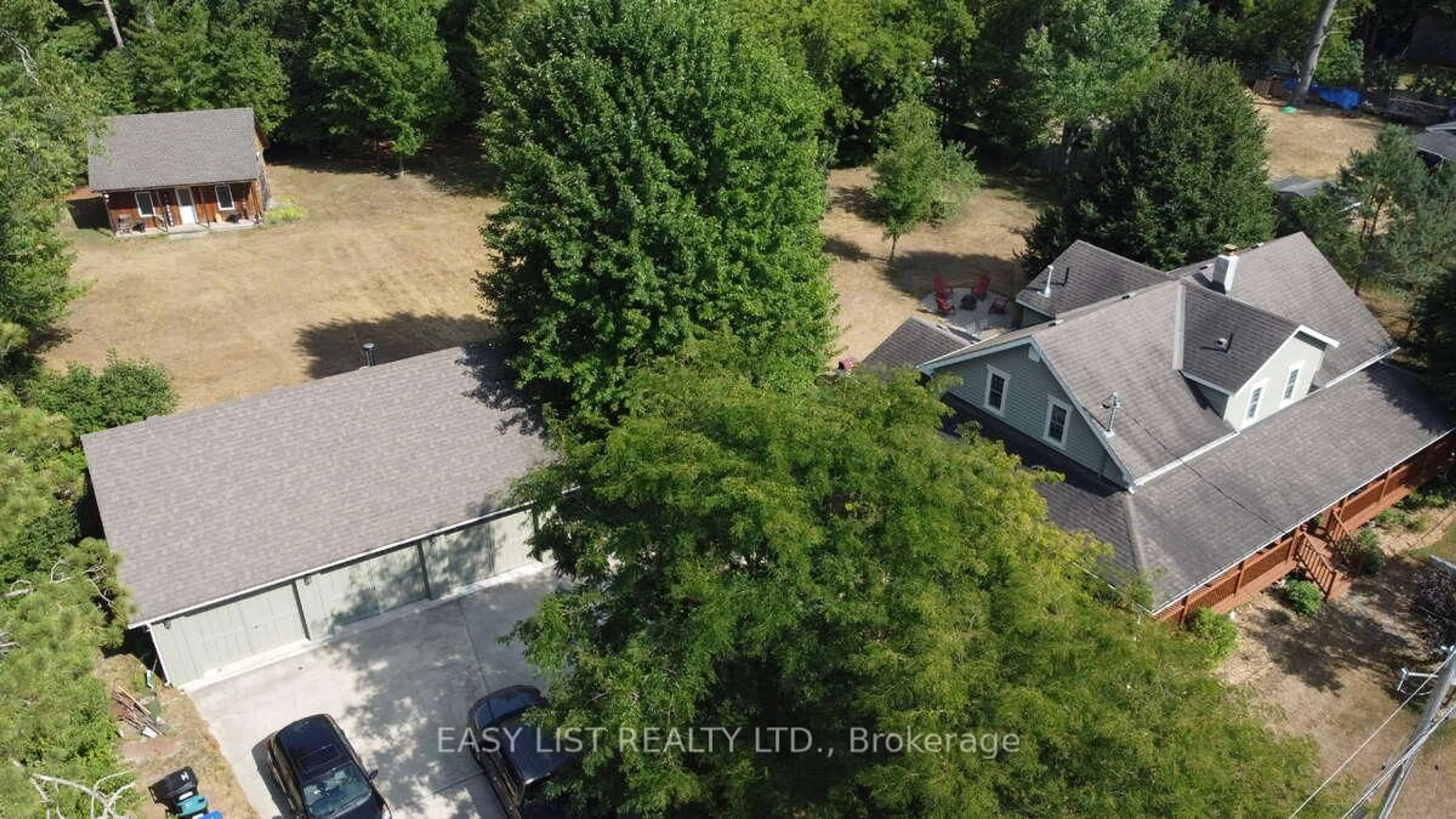 A pic from outside/outdoor area/front of a property/back of a property/a pic from drone, forest/trees view for 18 Mill St, Essa Ontario L3W 0V7
