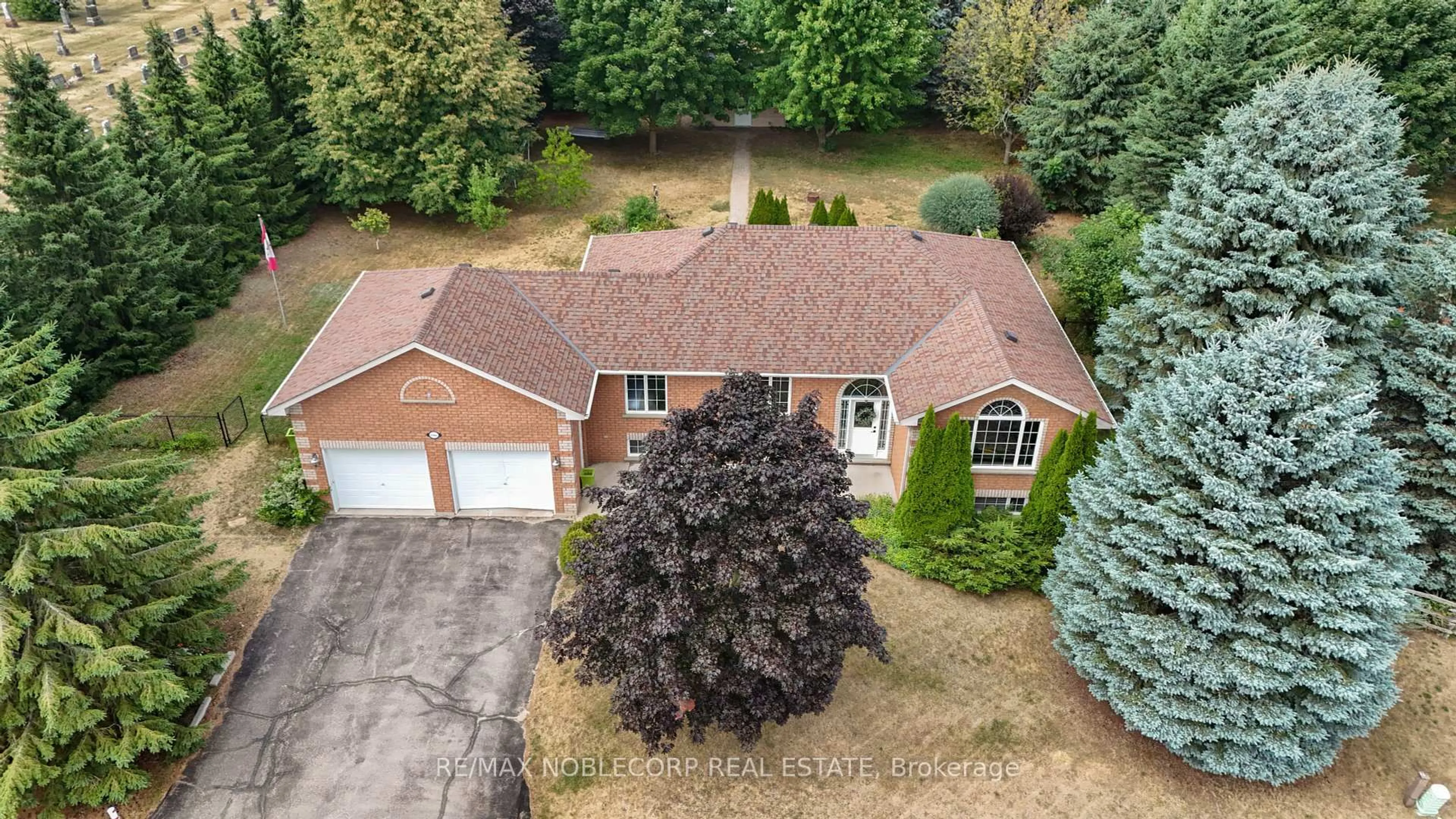 A pic from outside/outdoor area/front of a property/back of a property/a pic from drone, street for 1 Dekker St, Adjala-Tosorontio Ontario L0M 1J0
