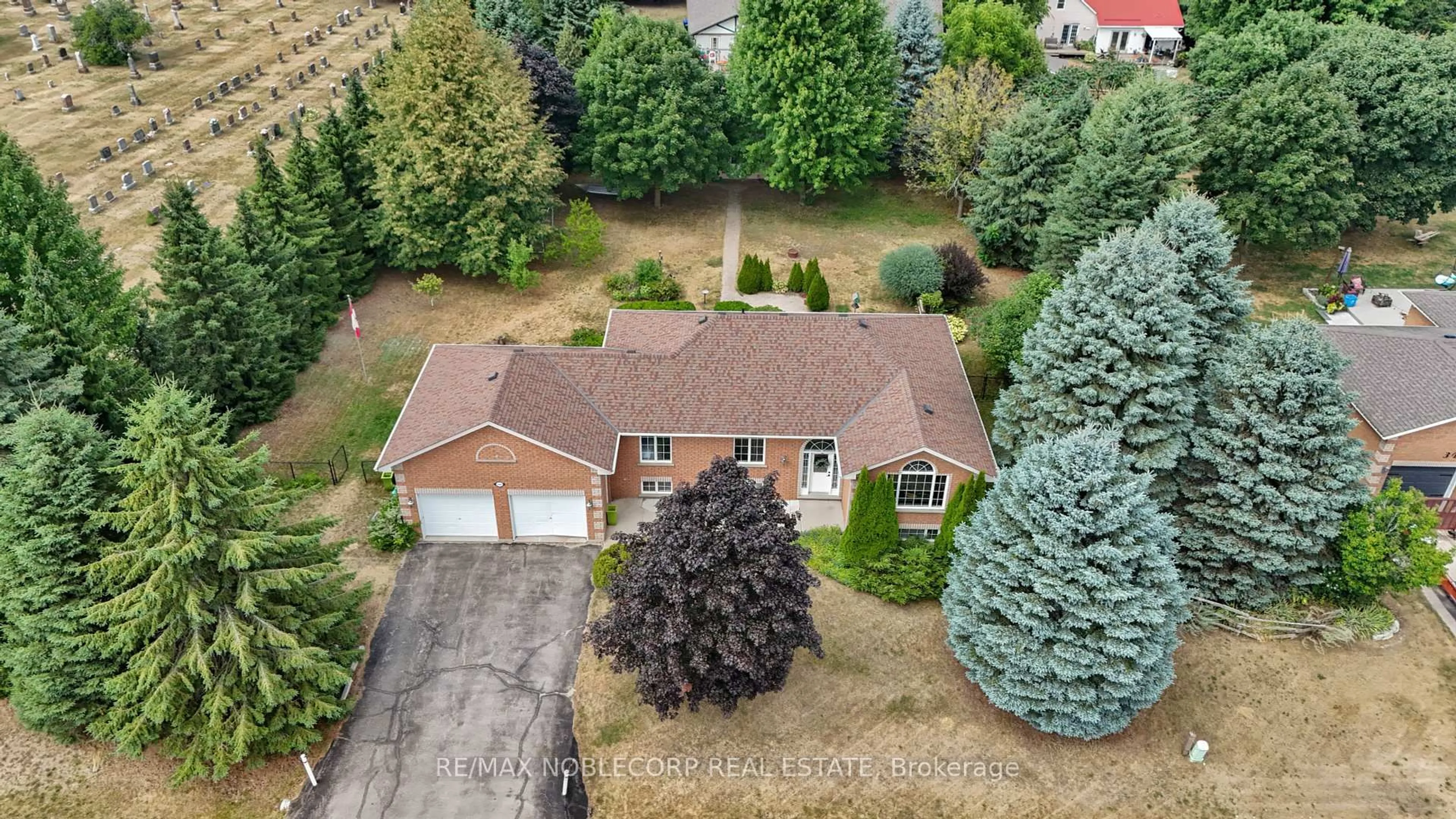 A pic from outside/outdoor area/front of a property/back of a property/a pic from drone, street for 1 Dekker St, Adjala-Tosorontio Ontario L0M 1J0