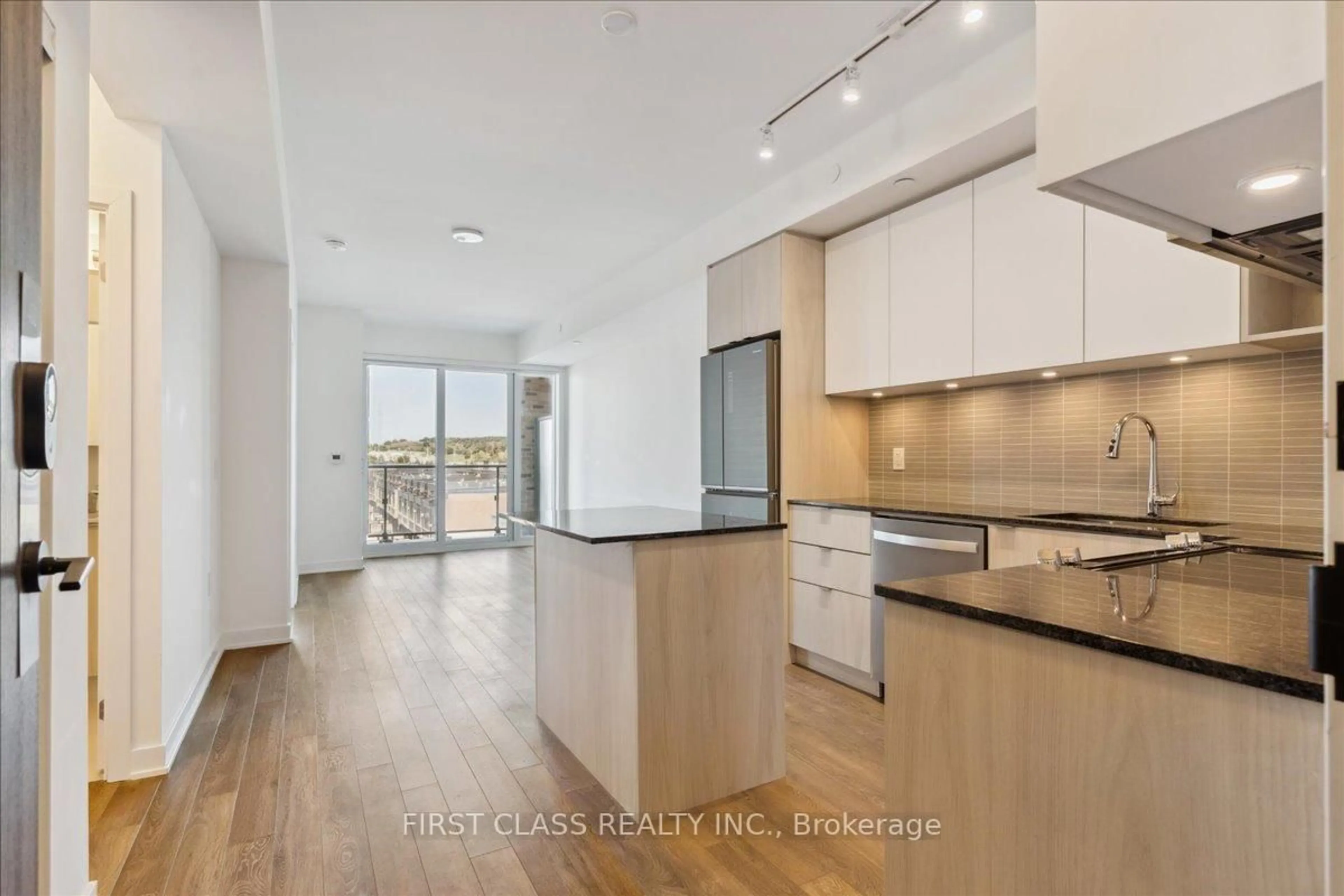 Open concept kitchen, wood/laminate floor for 100 Eagle Rock Way #403, Vaughan Ontario L6A 5B9