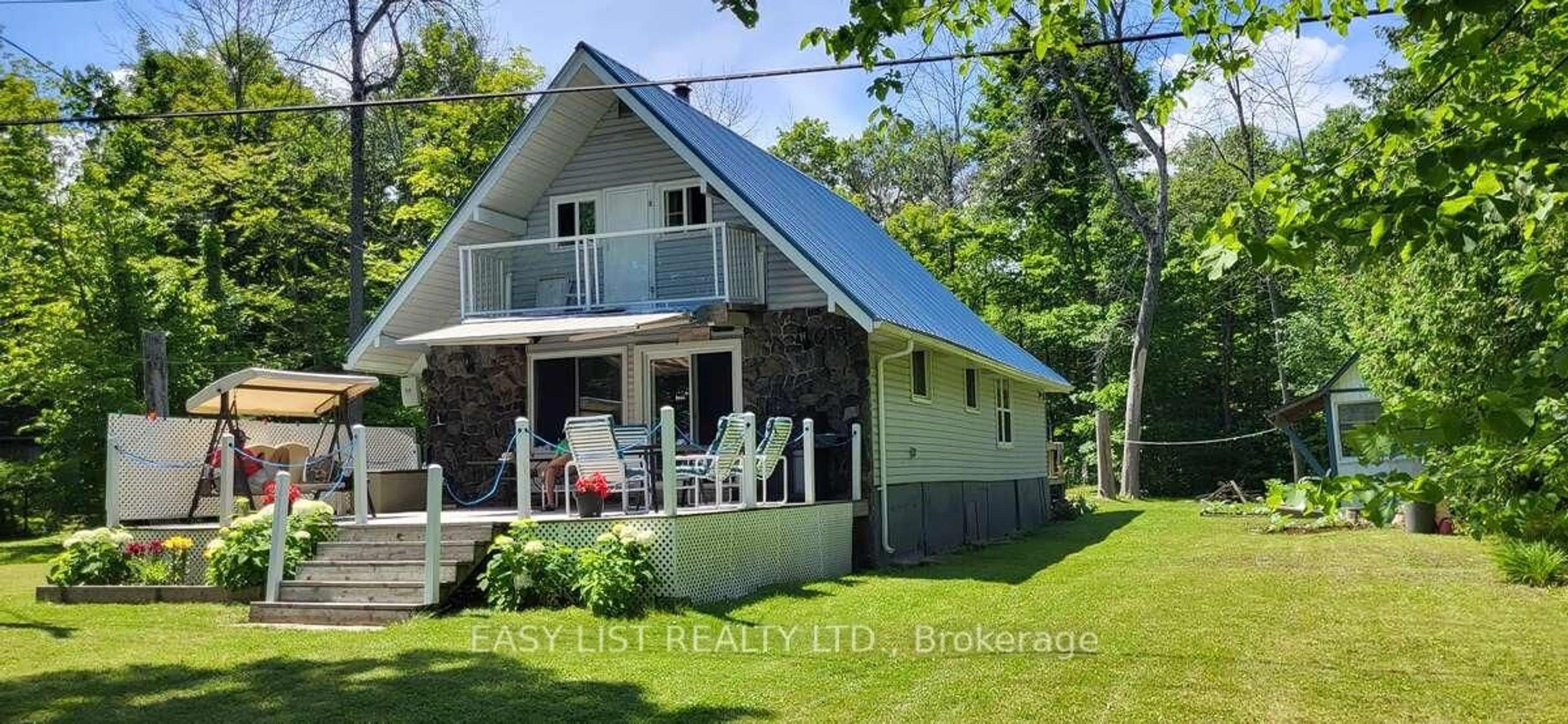 Home with vinyl exterior material, water/lake/river/ocean view for 29 Snake Island Rd, Georgina Islands Ontario L0E 1R0