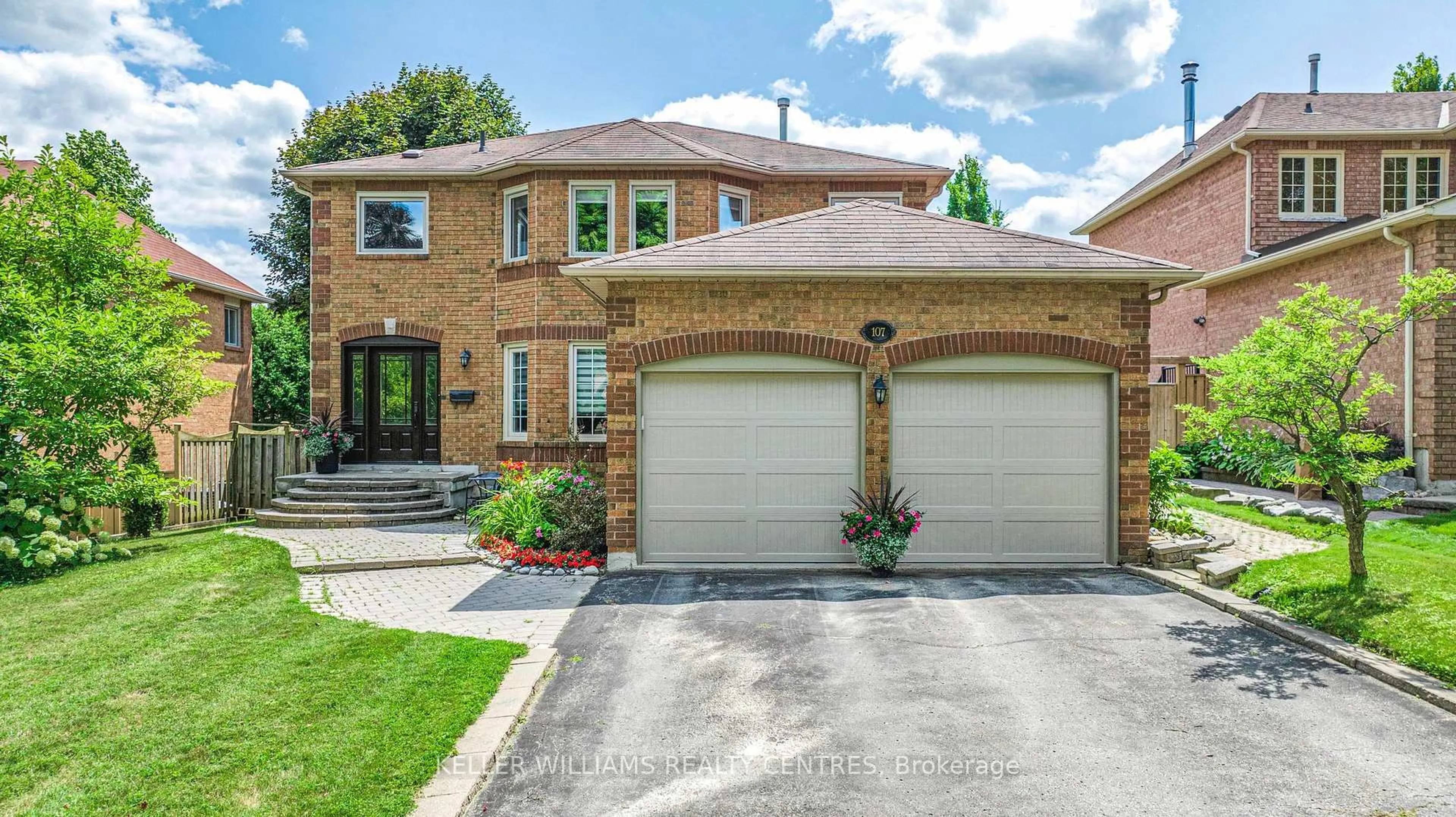 Home with brick exterior material, street for 107 Rhodes Circ, Newmarket Ontario L3X 1V2