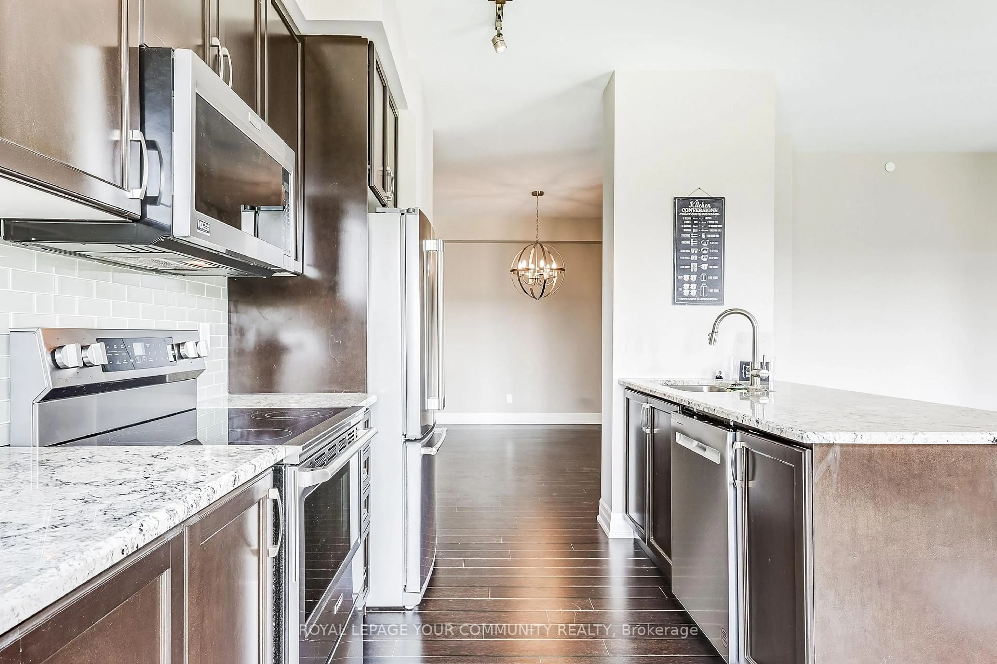 Open concept kitchen, unknown for 111 Civic Square Gate #306, Aurora Ontario L4G 0S6