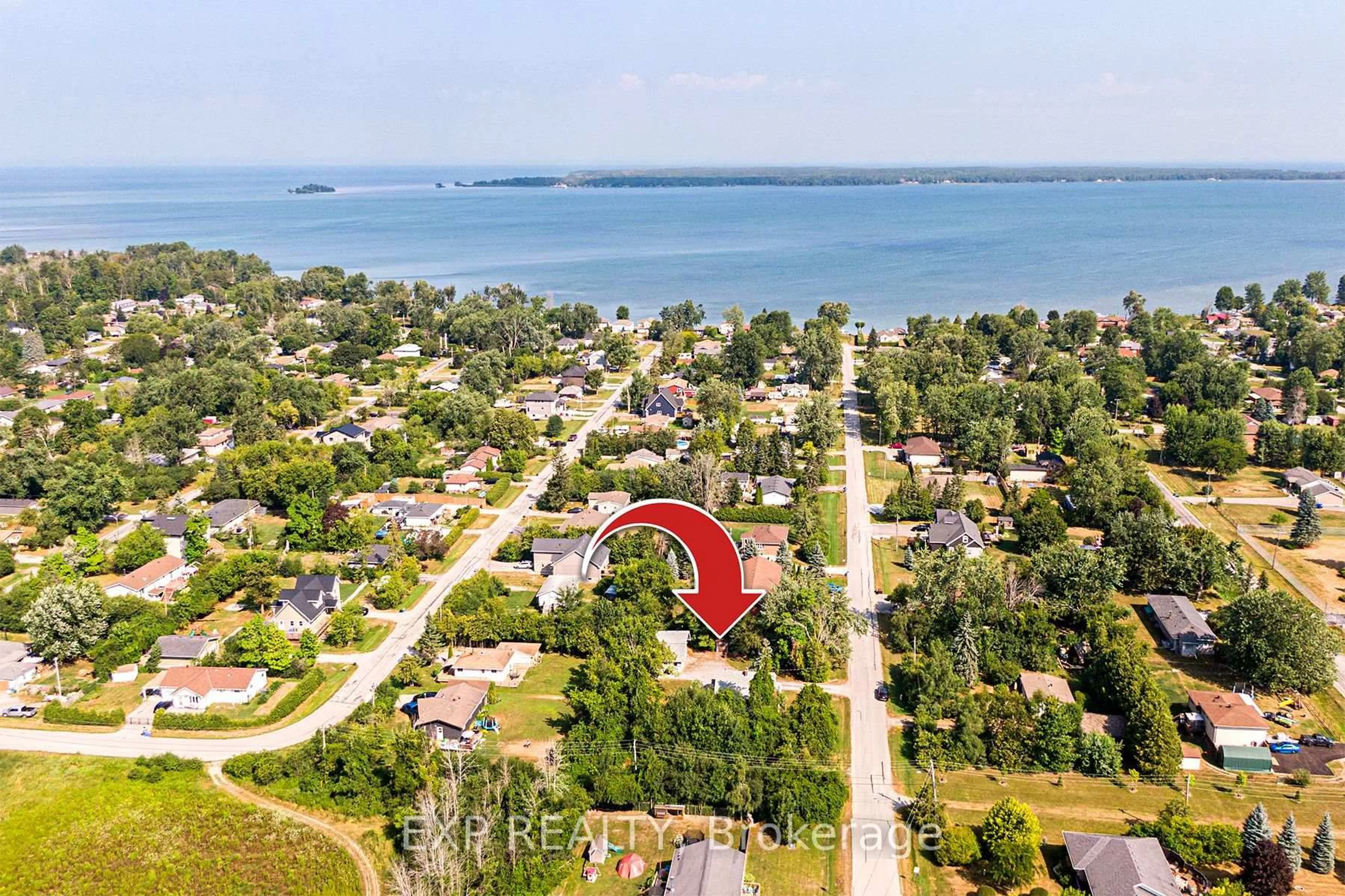 A pic from outside/outdoor area/front of a property/back of a property/a pic from drone, water/lake/river/ocean view for 76 Sunset Beach Rd, Georgina Ontario L0E 1N0