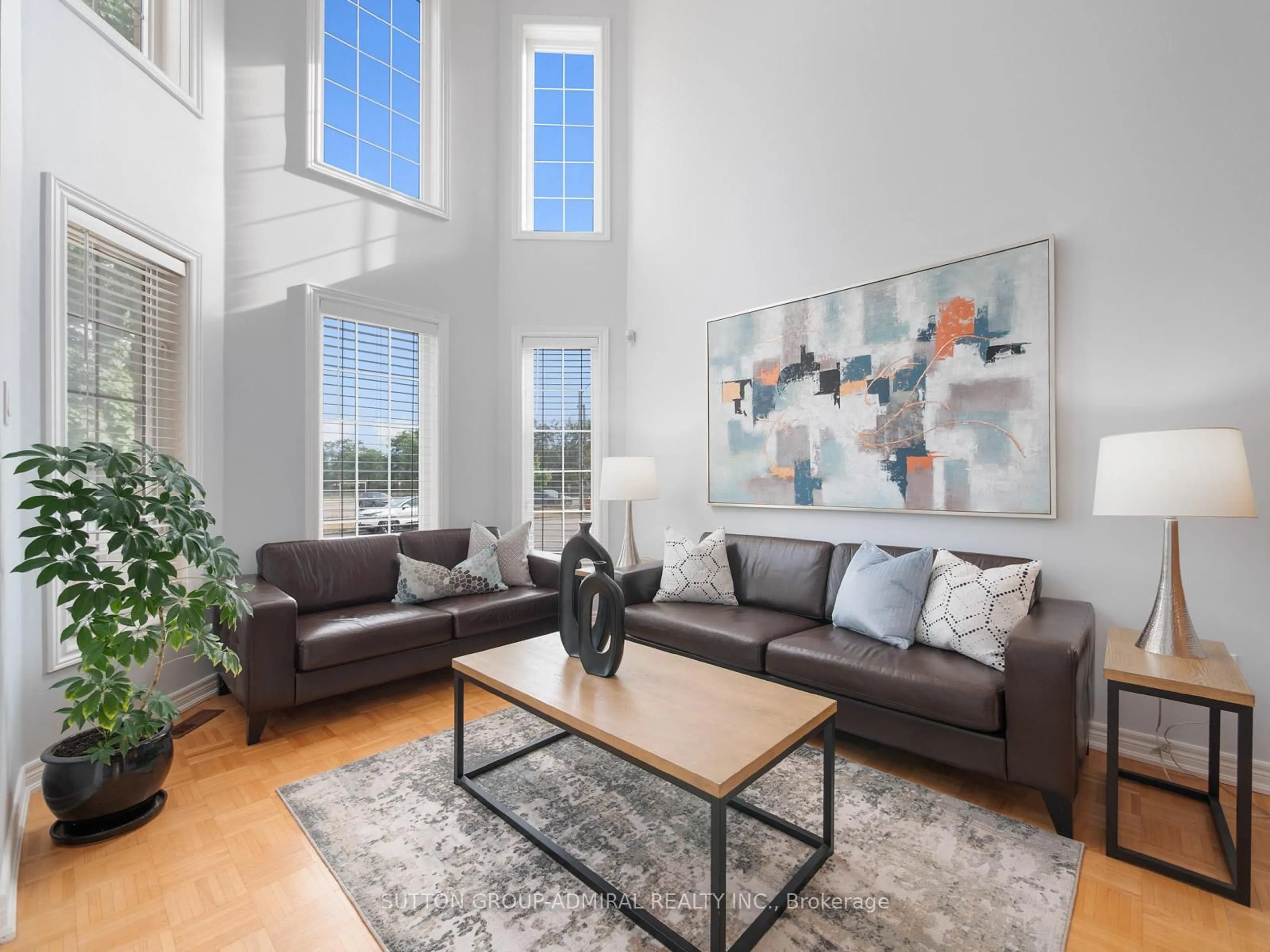 Living room with furniture, wood/laminate floor for 190 Maria Antonia Rd, Vaughan Ontario L4H 2Z4