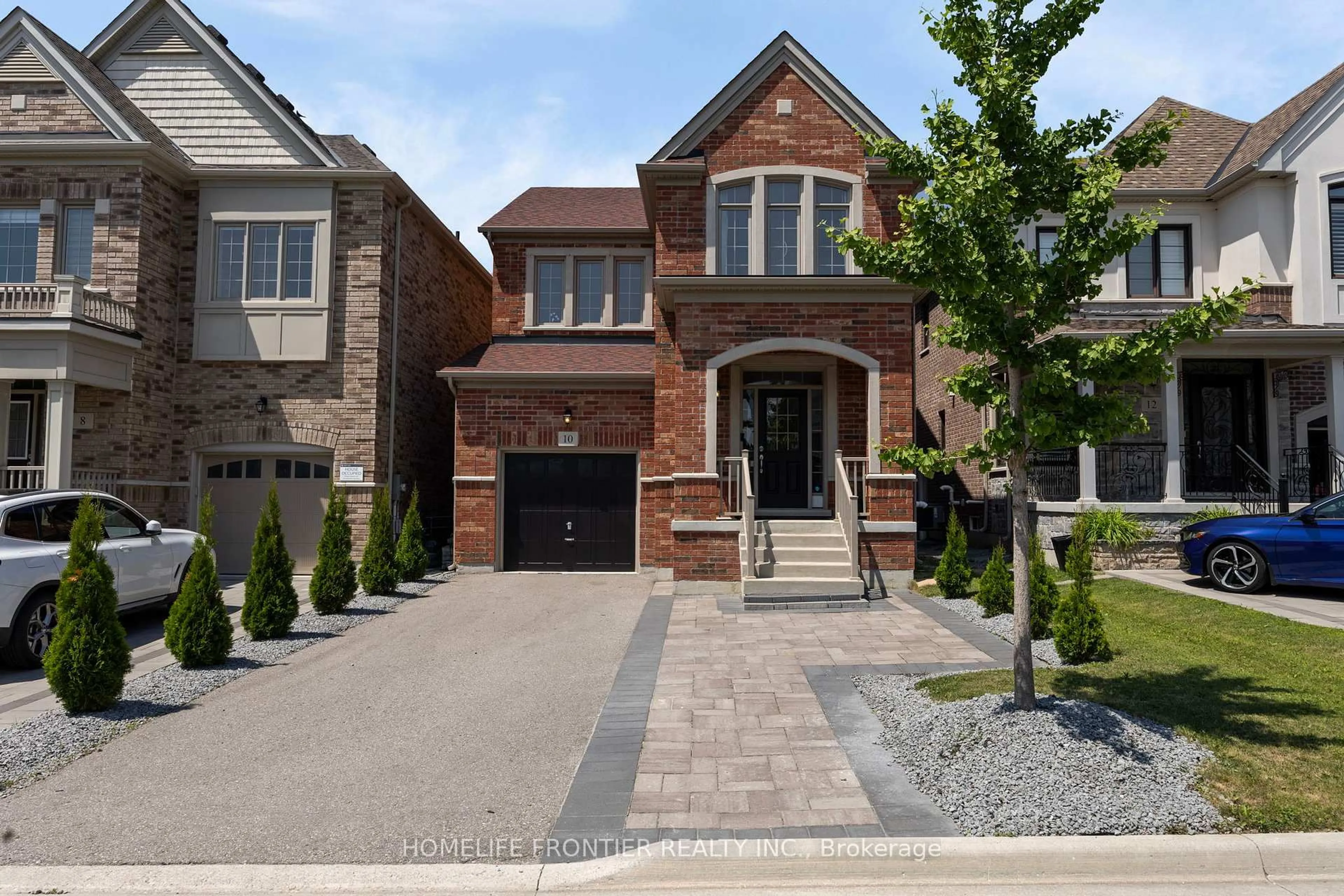 Home with brick exterior material, street for 10 Festival Crt, East Gwillimbury Ontario L9N 0N8