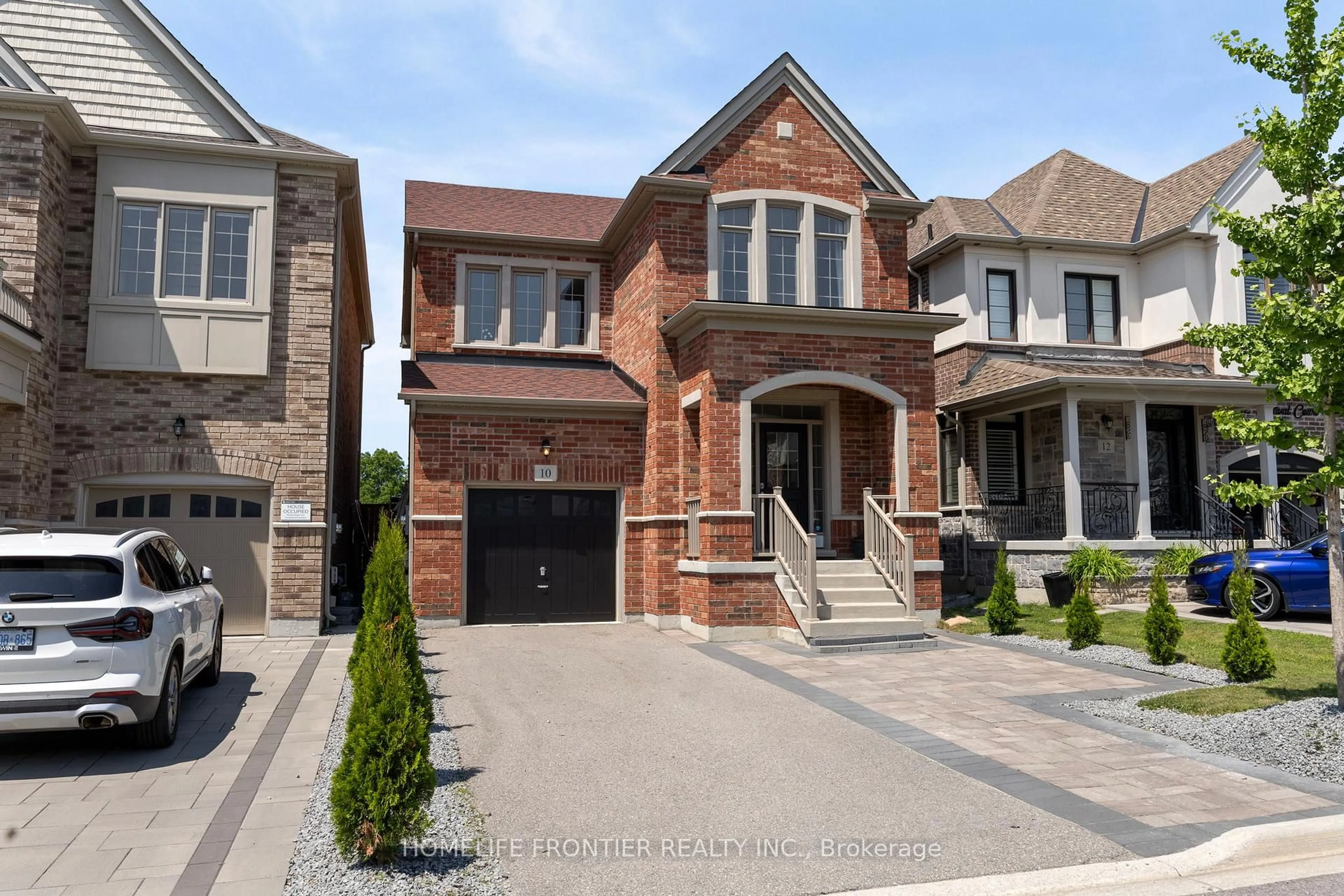 Home with brick exterior material, street for 10 Festival Crt, East Gwillimbury Ontario L9N 0N8