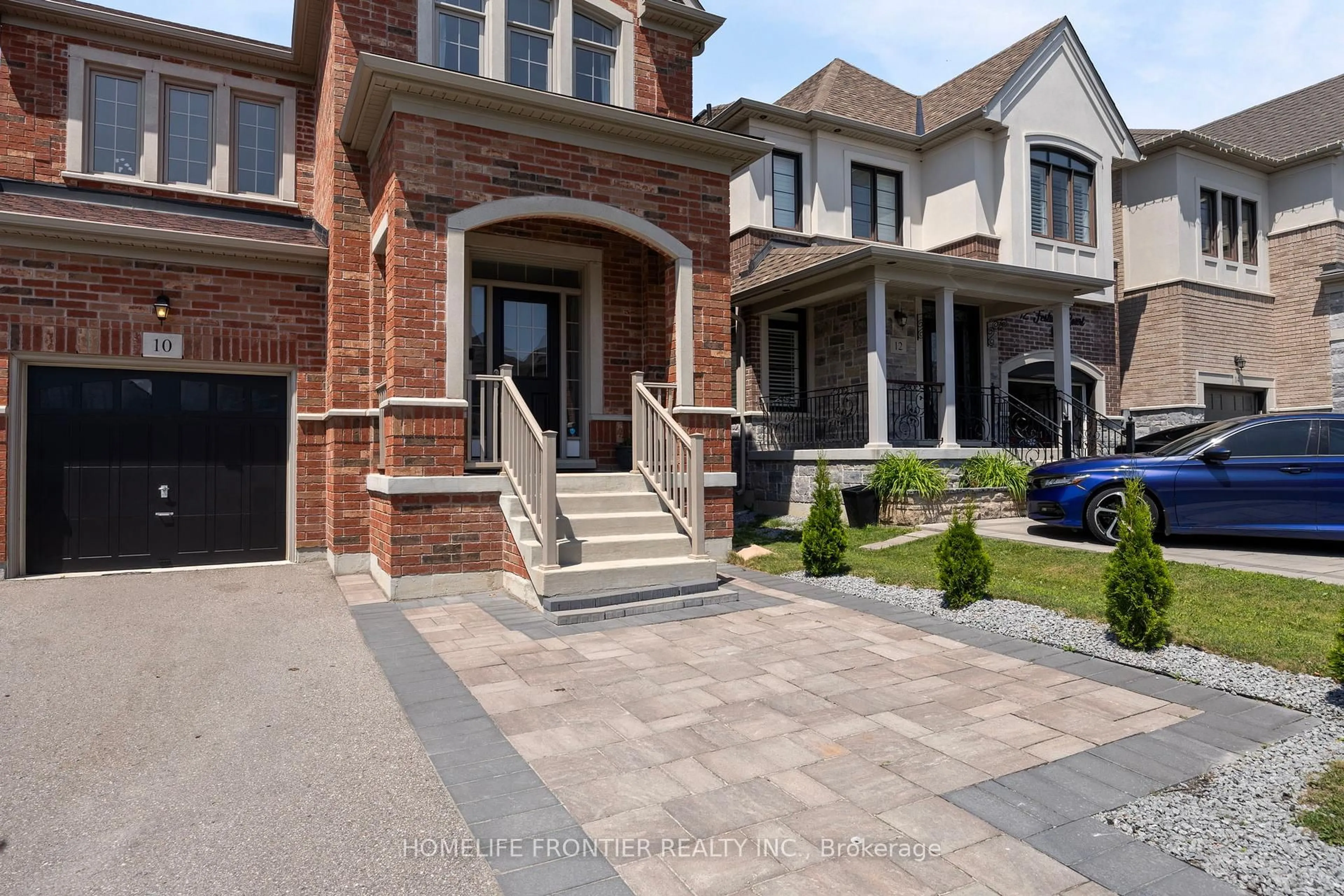 Home with brick exterior material, street for 10 Festival Crt, East Gwillimbury Ontario L9N 0N8