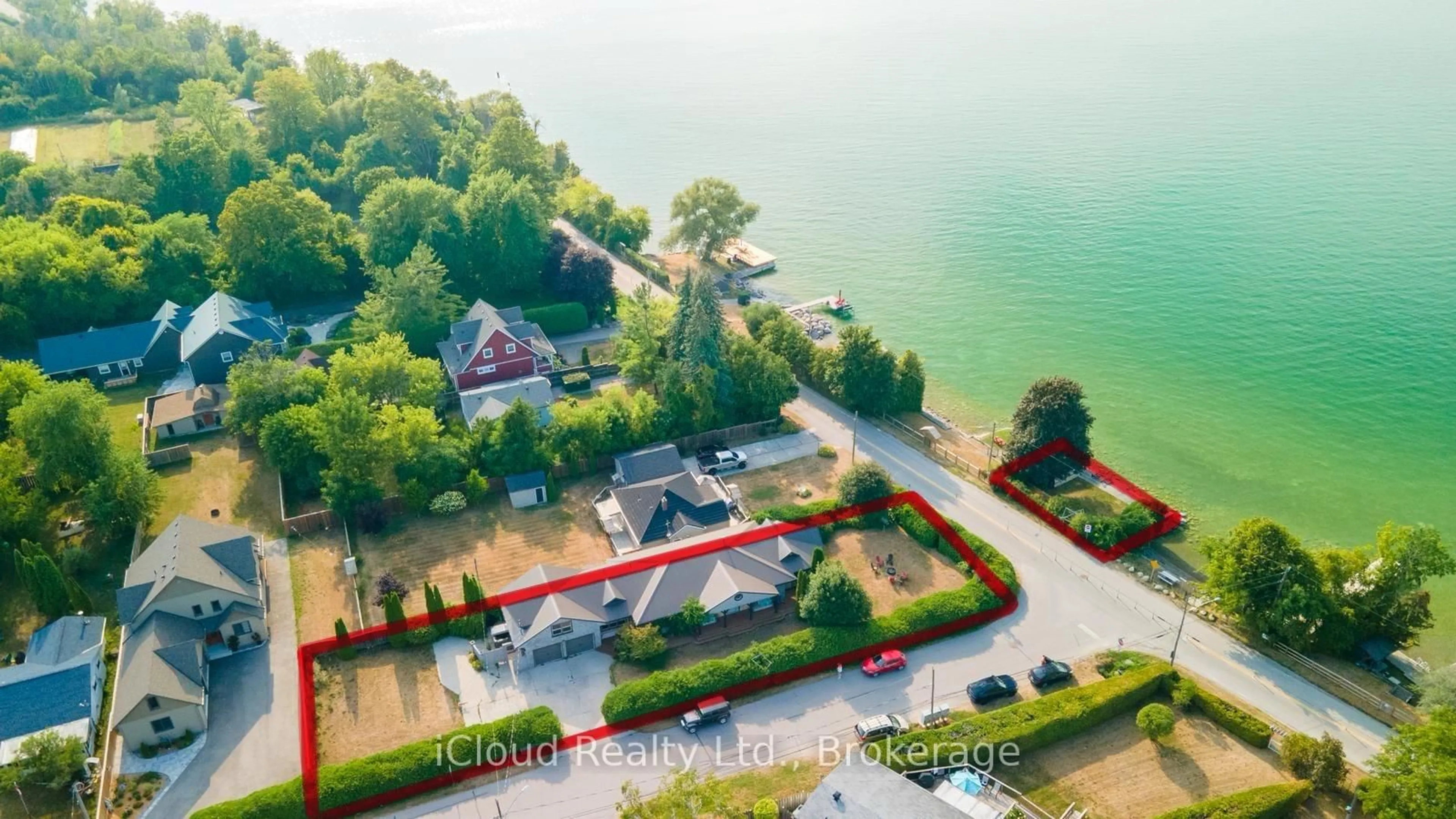 A pic from outside/outdoor area/front of a property/back of a property/a pic from drone, water/lake/river/ocean view for 523 Lake Dr, Georgina Ontario L0E 1S0
