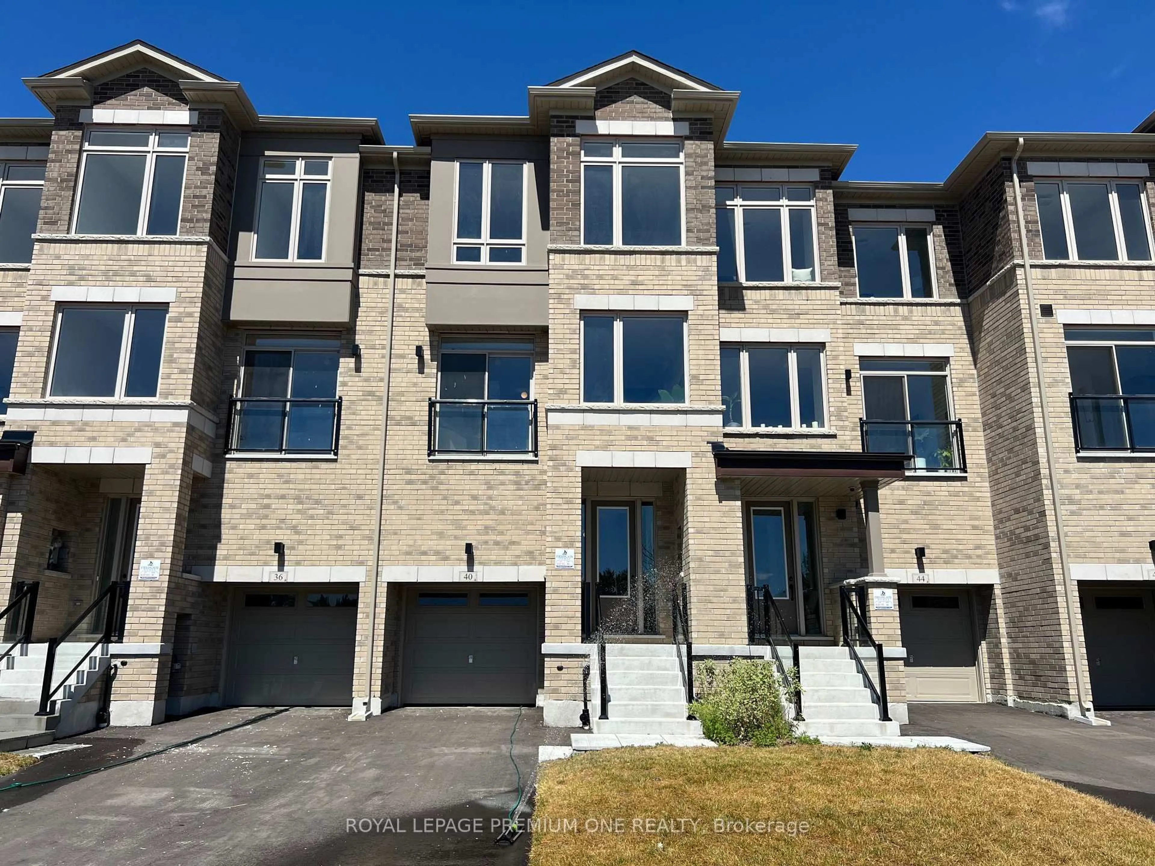 Home with brick exterior material, street for 40 Tennant Circ, Vaughan Ontario L4G 5L5