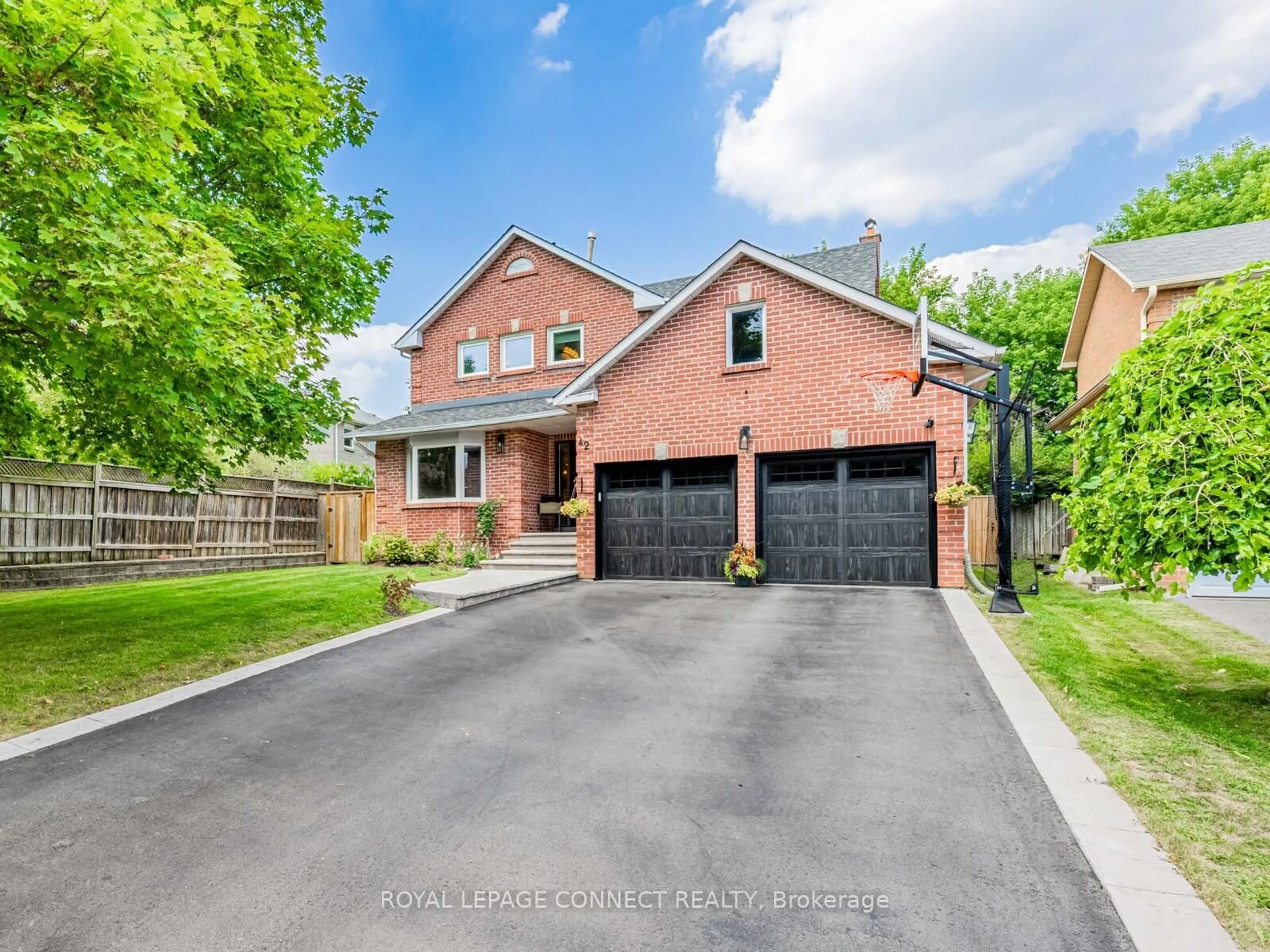 Home with brick exterior material, street for 42 Lyndhurst Dr, Markham Ontario L3T 6S5
