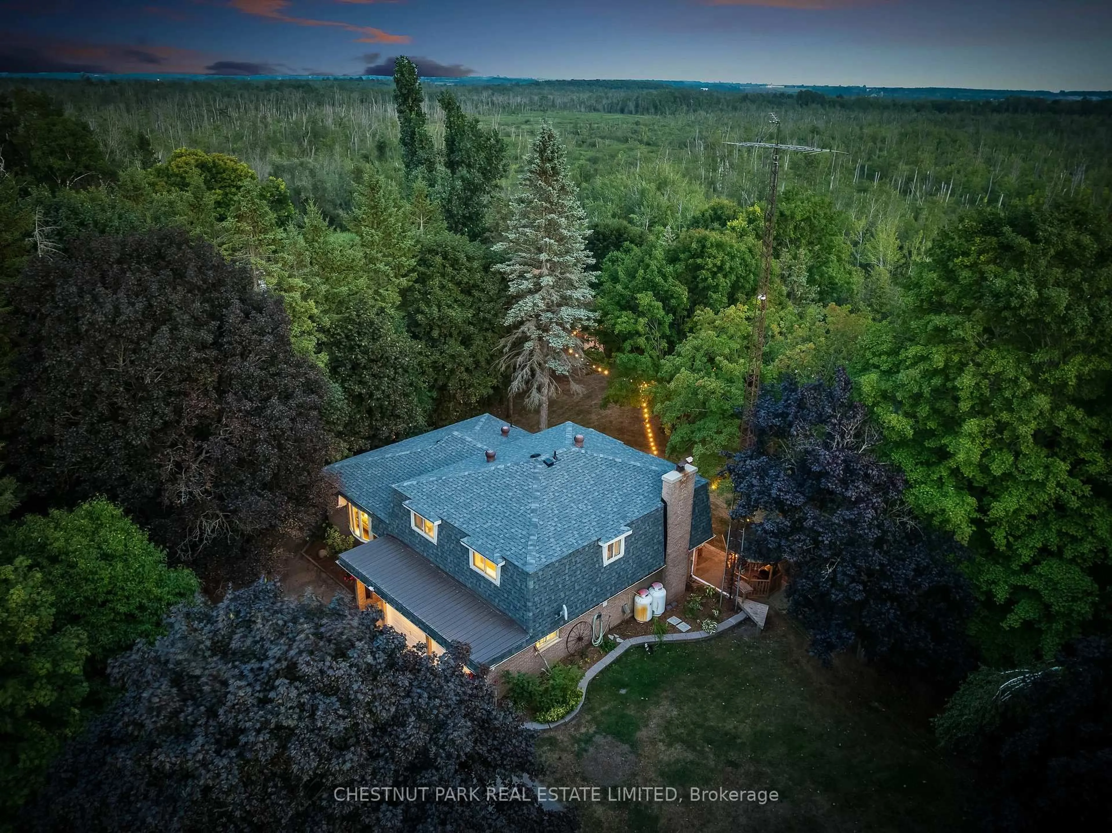 A pic from outside/outdoor area/front of a property/back of a property/a pic from drone, forest/trees view for 720 Highway 48, Brock Ontario L0K 1A0
