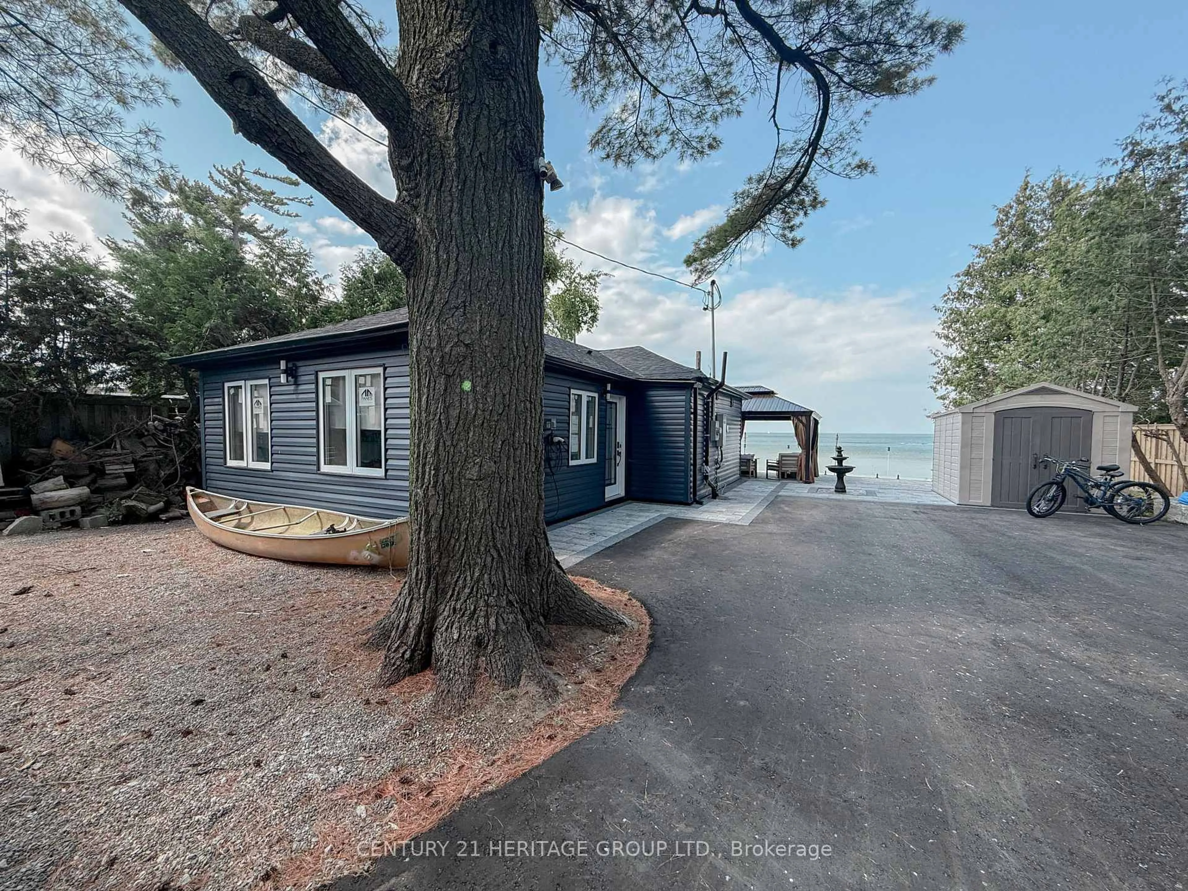 A pic from outside/outdoor area/front of a property/back of a property/a pic from drone, water/lake/river/ocean view for 110 Hedge Rd, Georgina Ontario L0E 1R0