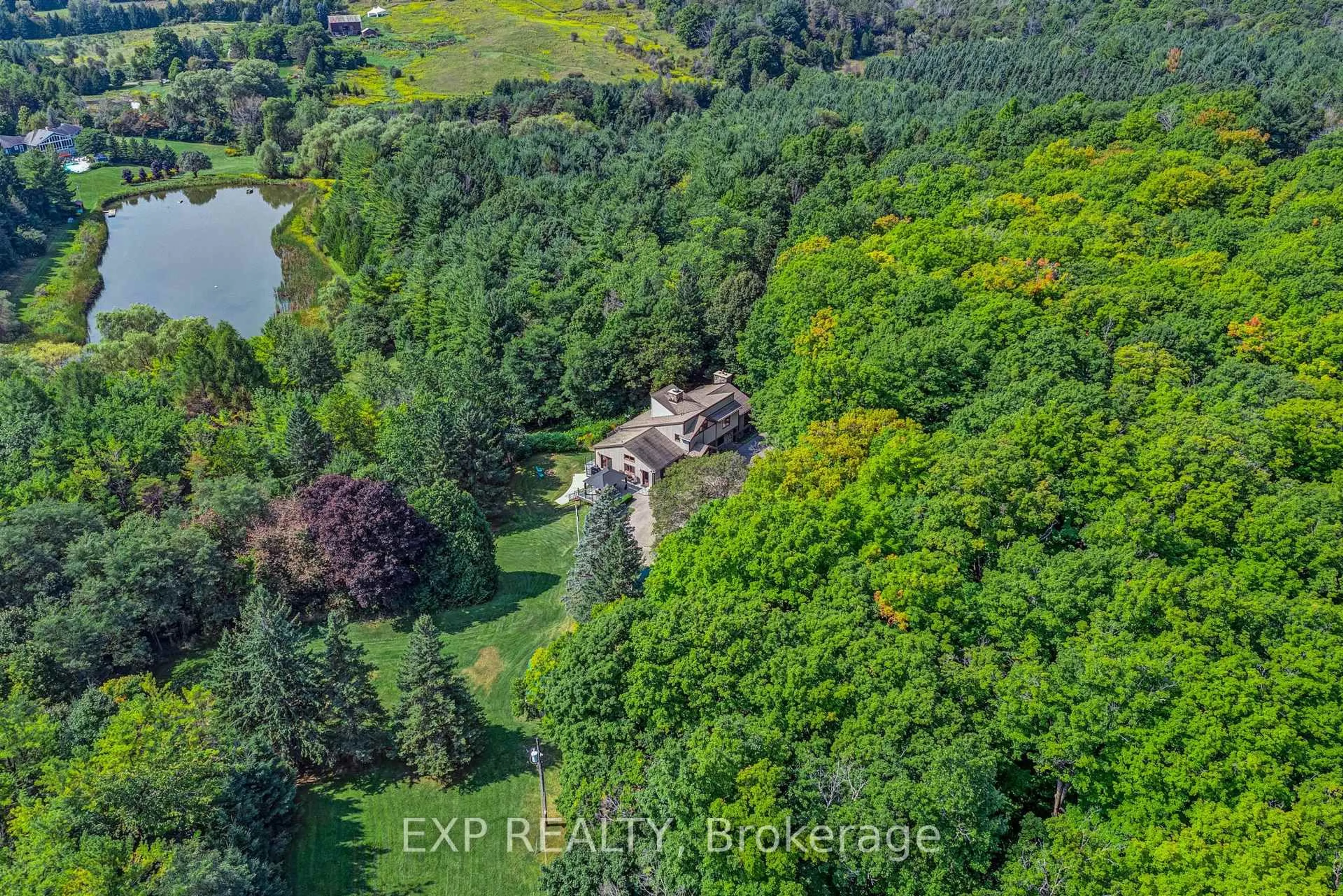 A pic from outside/outdoor area/front of a property/back of a property/a pic from drone, forest/trees view for 18340 Bathurst St, King Ontario L3Y 4V9