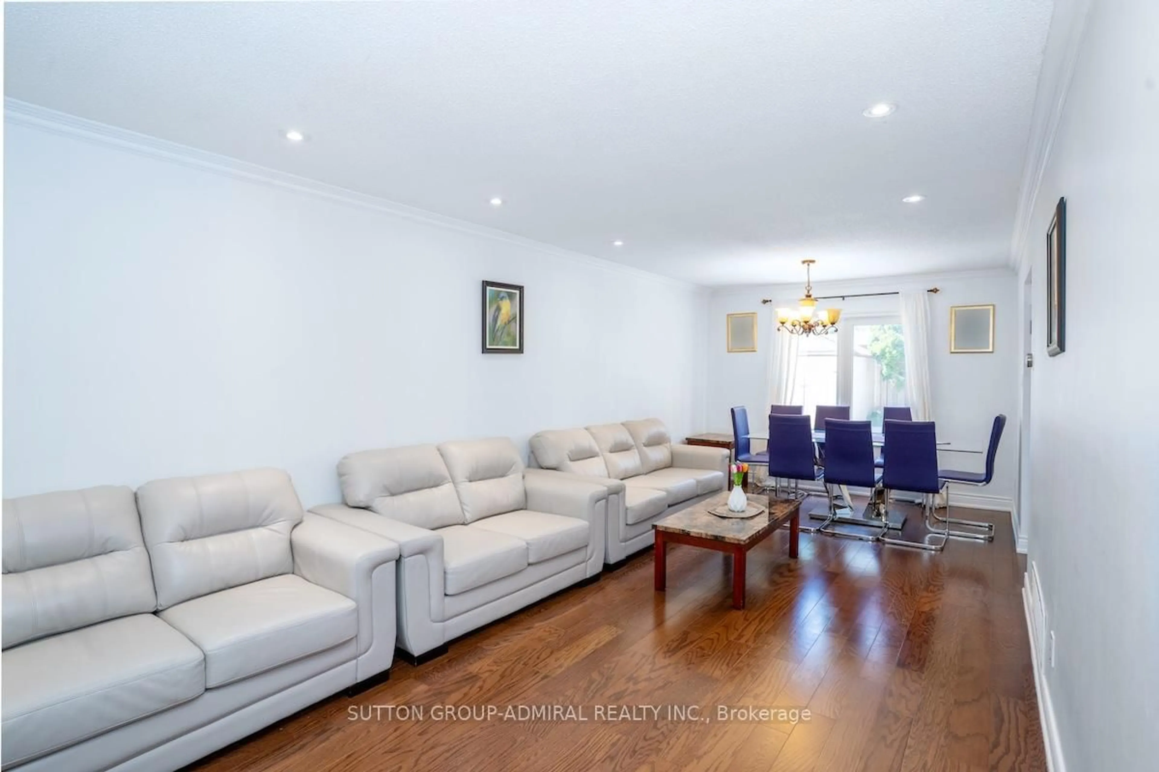 Living room with furniture, wood/laminate floor for 85 Glen Cres, Vaughan Ontario L4J 4W7
