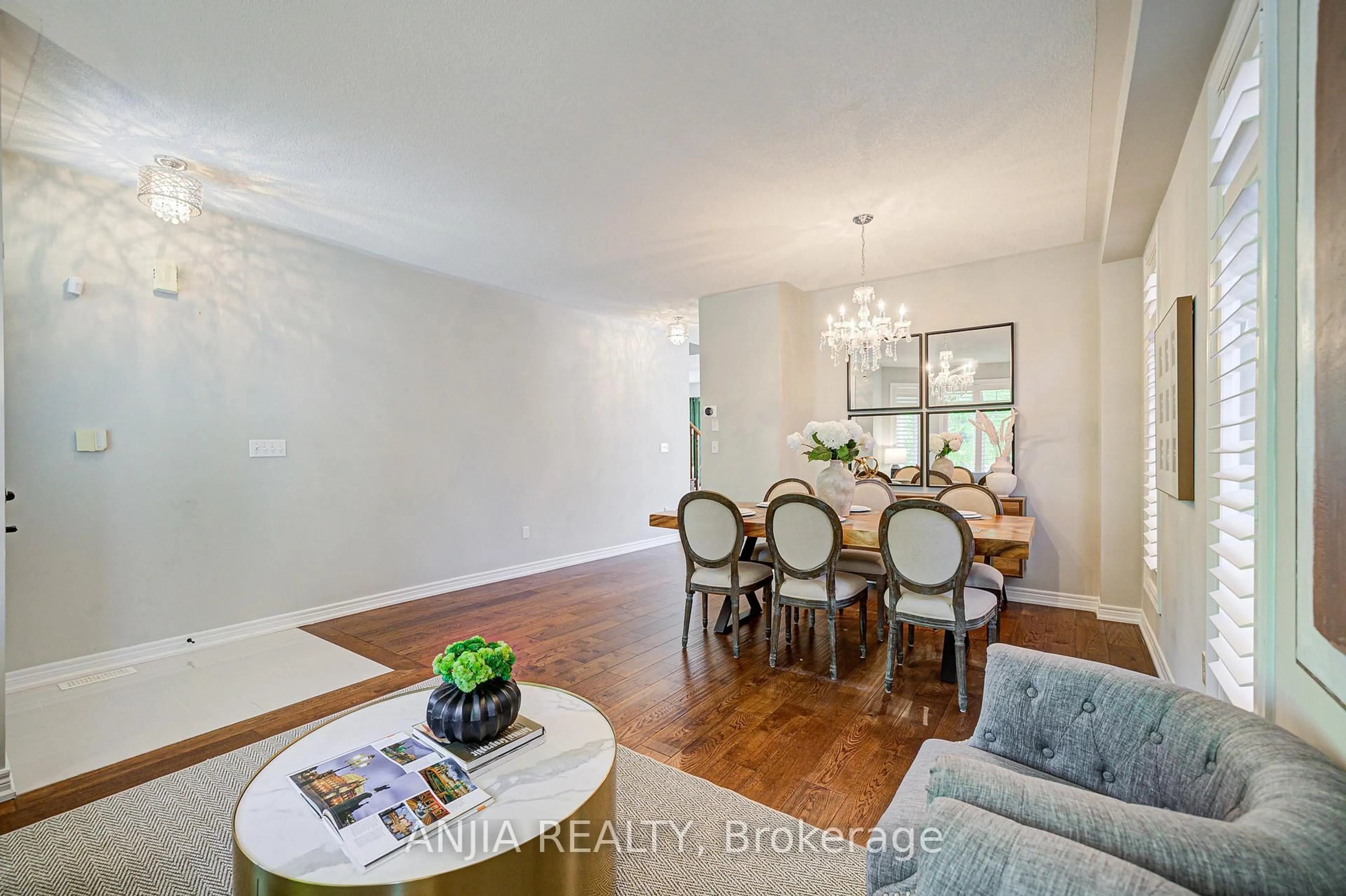Dining room, wood/laminate floor for 54 Rainbow Valley Cres, Markham Ontario L6E 1Z1