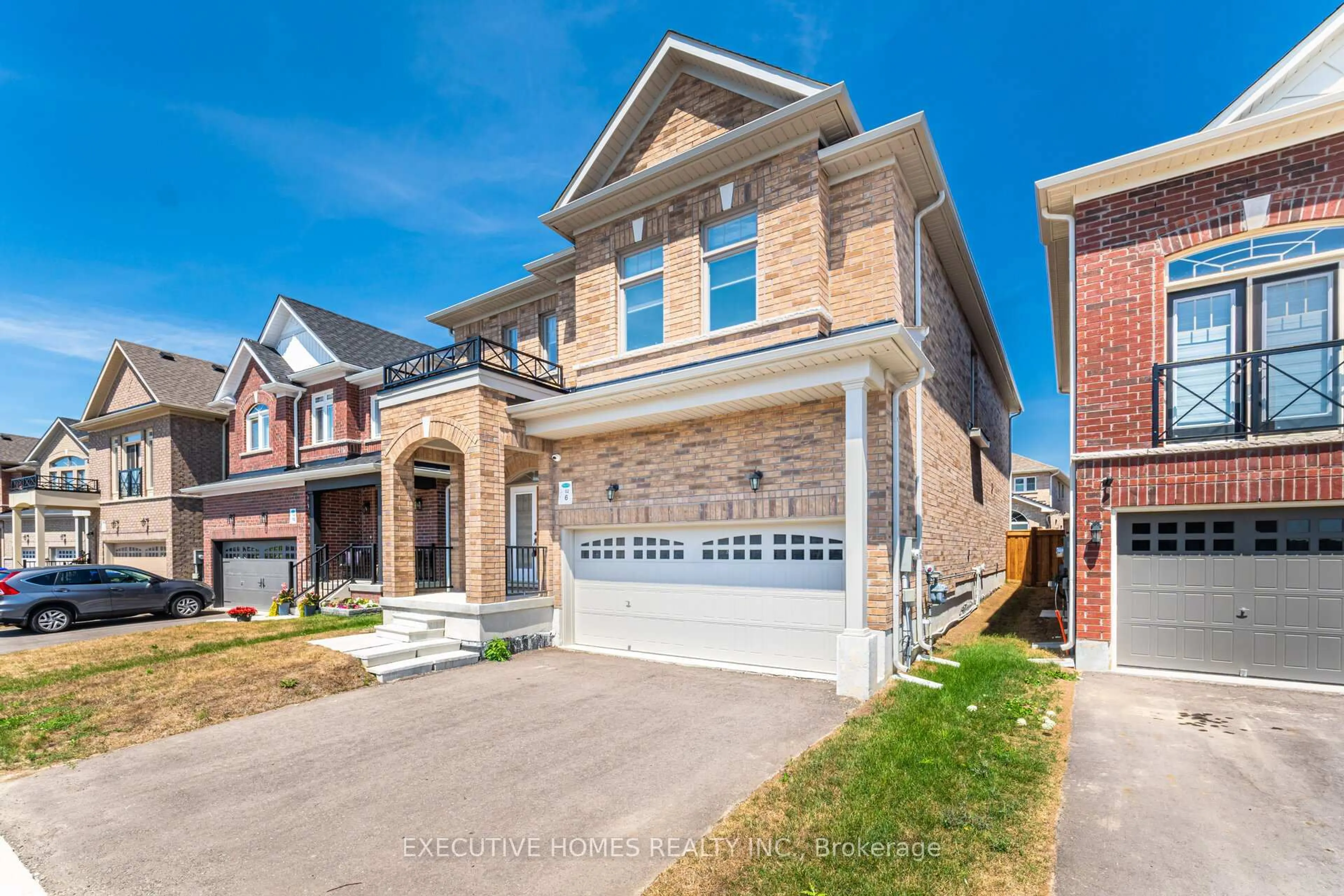 Home with brick exterior material, street for 14 Mac Campbell Way, Bradford West Gwillimbury Ontario L3Z 4M7