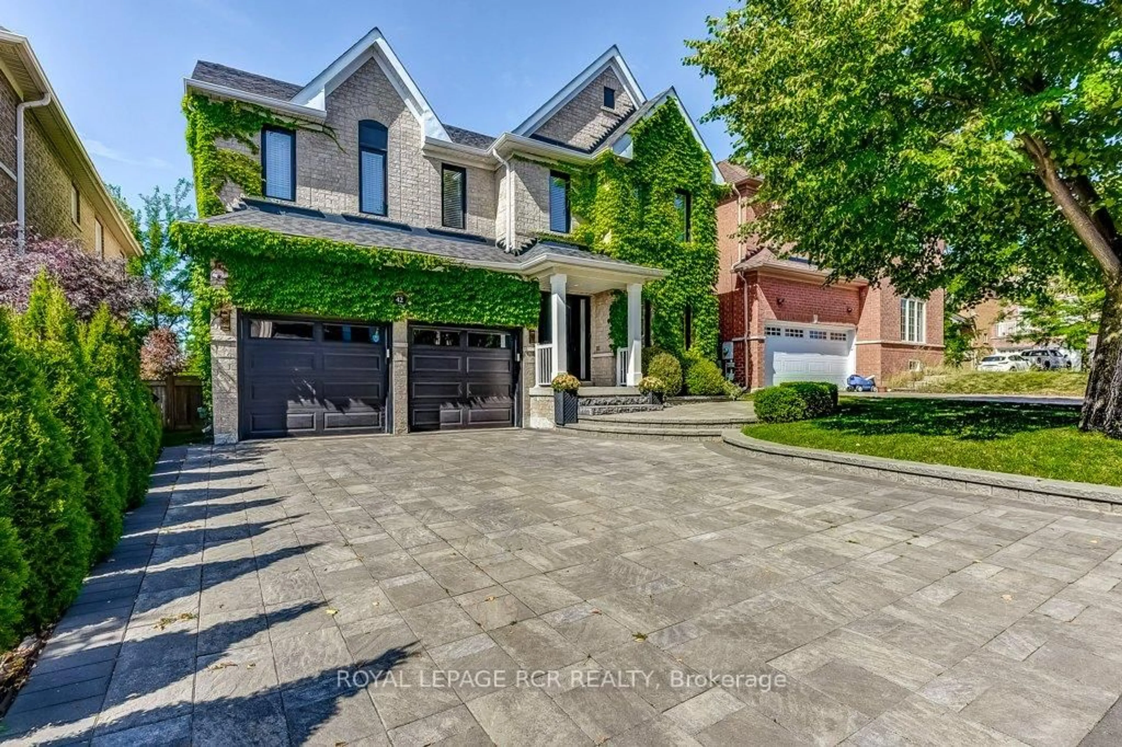 Home with brick exterior material, street for 42 Mynden Way, Newmarket Ontario L3X 3A8