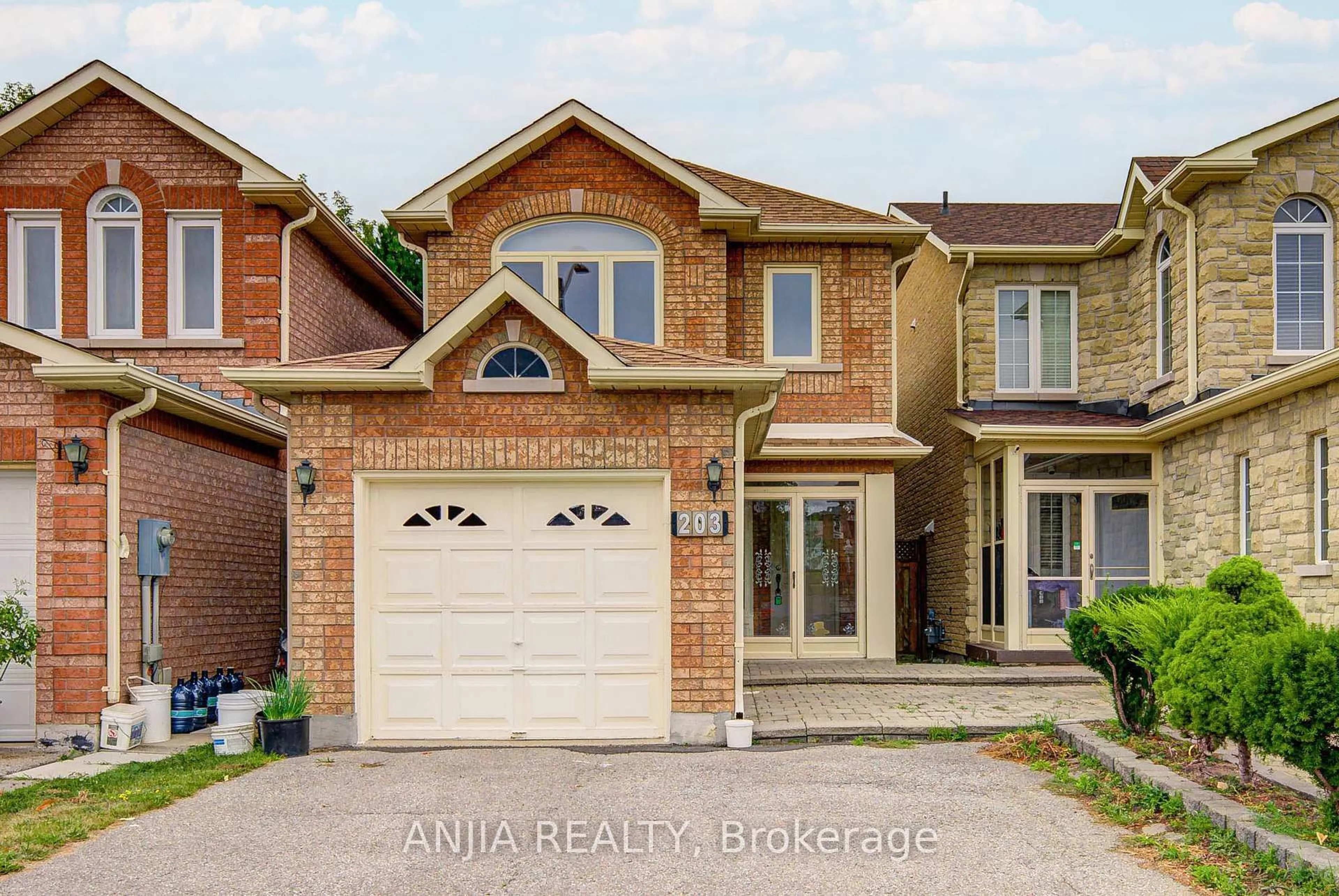 Home with brick exterior material, street for 203 Milliken Meadows Dr, Markham Ontario L3R 0V9
