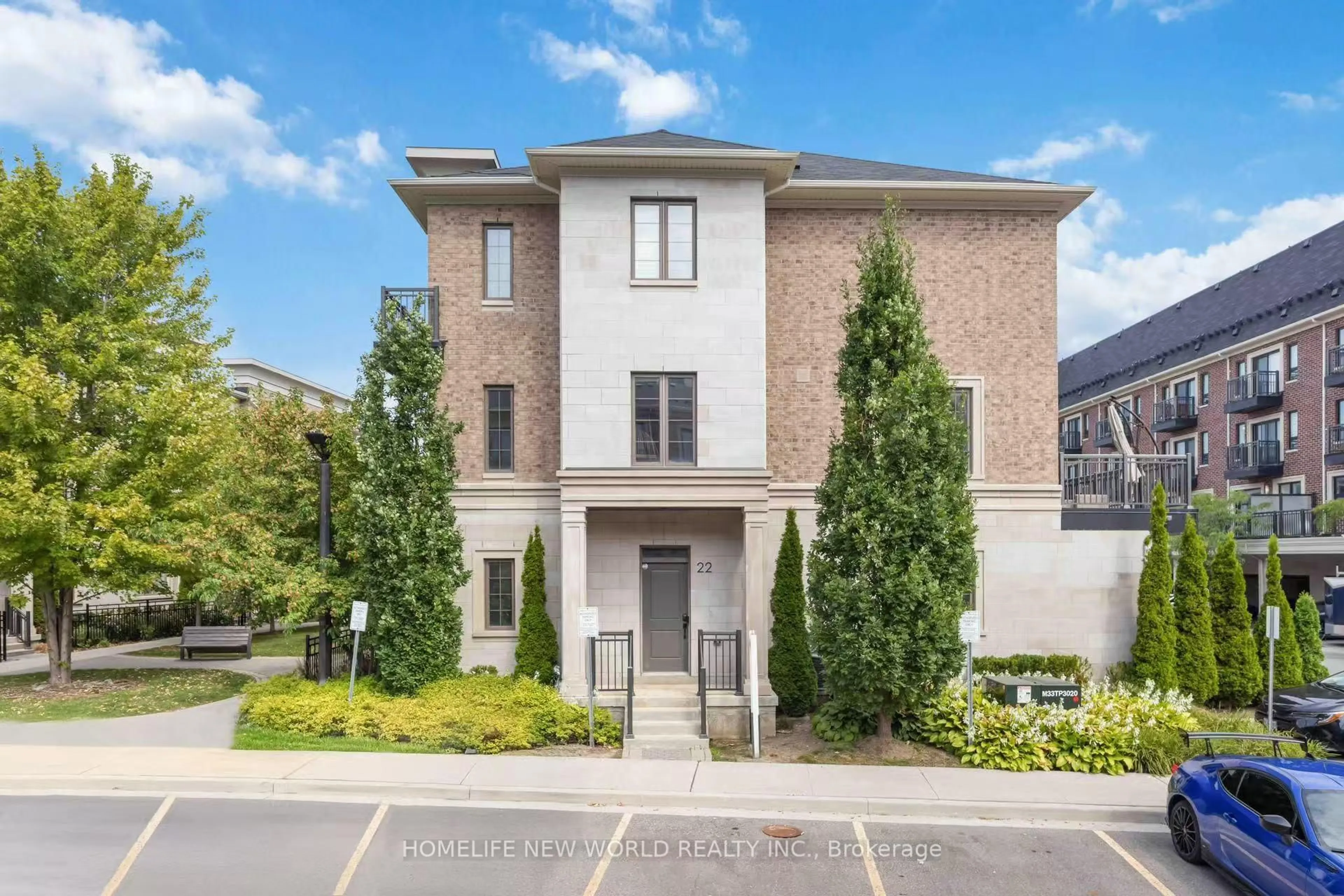 Home with brick exterior material, street for 22 American Elm Way, Markham Ontario L3R 3R8