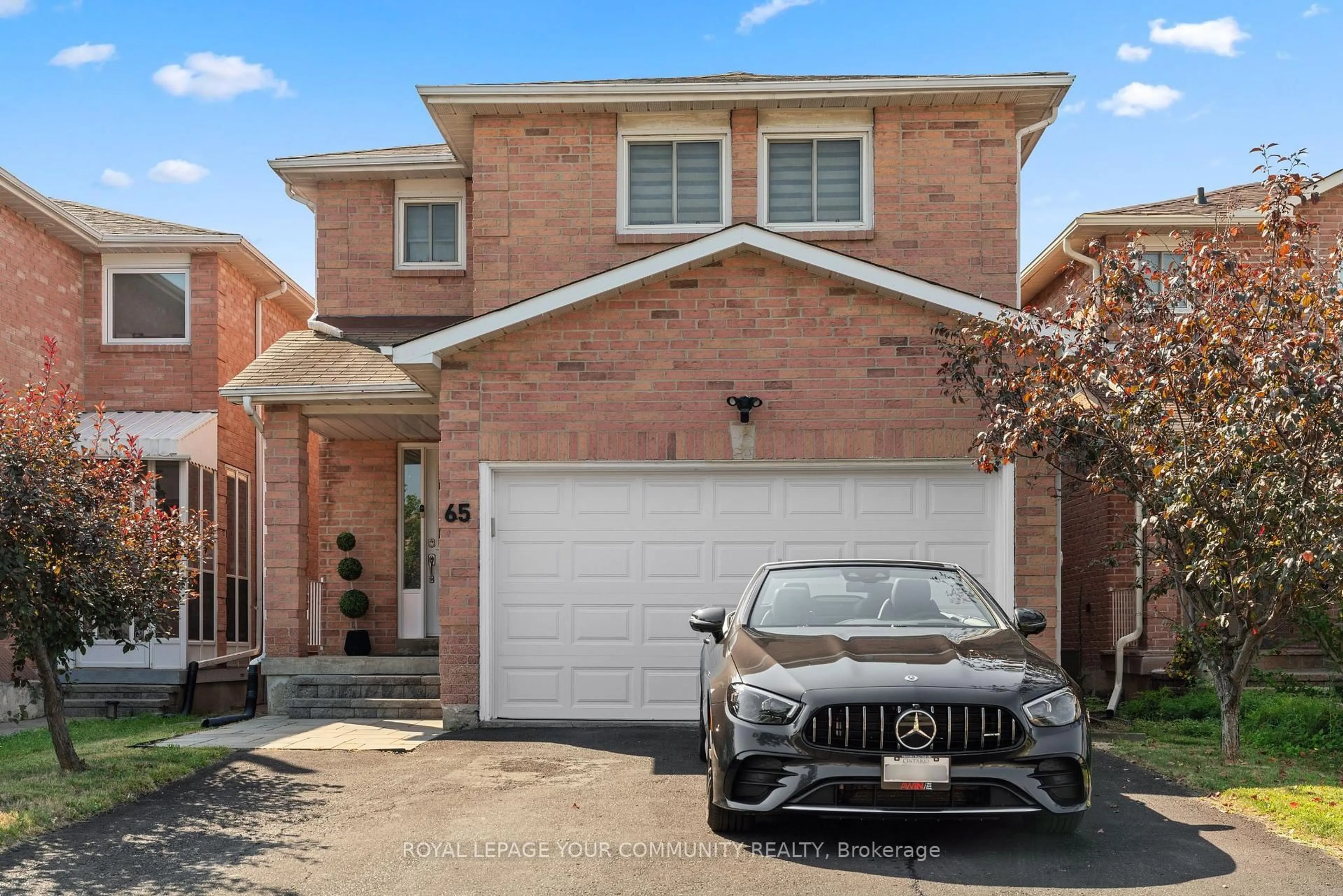 Home with brick exterior material, street for 65 Westhampton Dr, Vaughan Ontario L4J 7H5