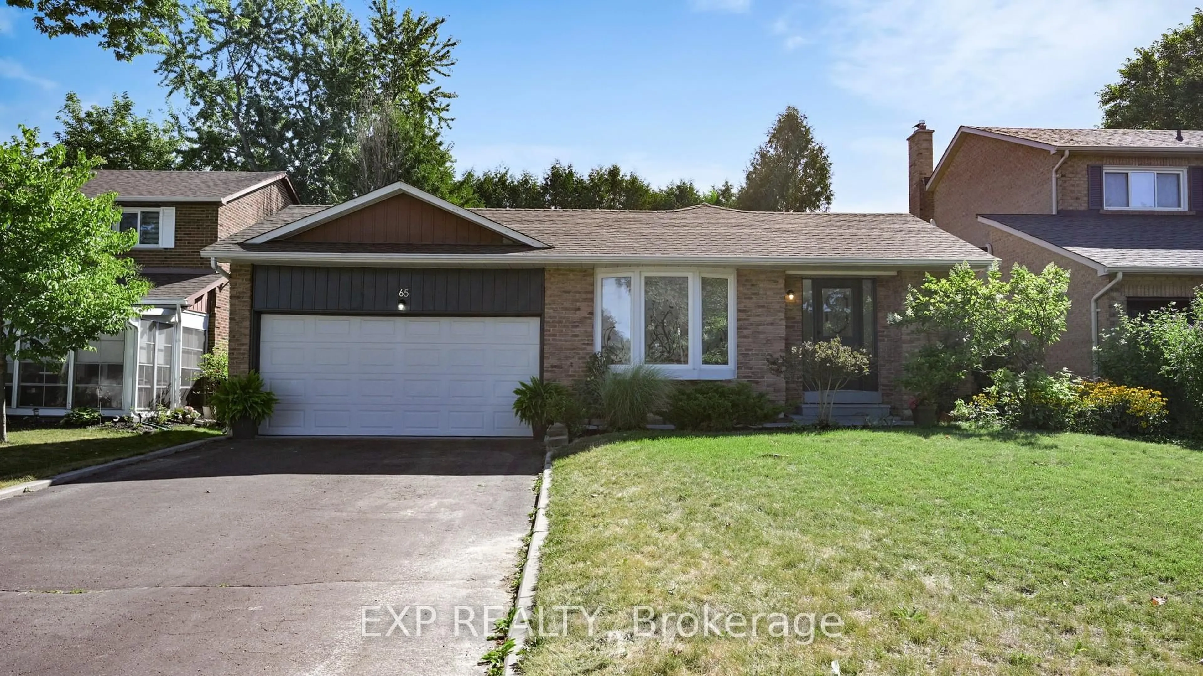 Home with brick exterior material, street for 65 Lowe Blvd, Newmarket Ontario L3Y 6H1