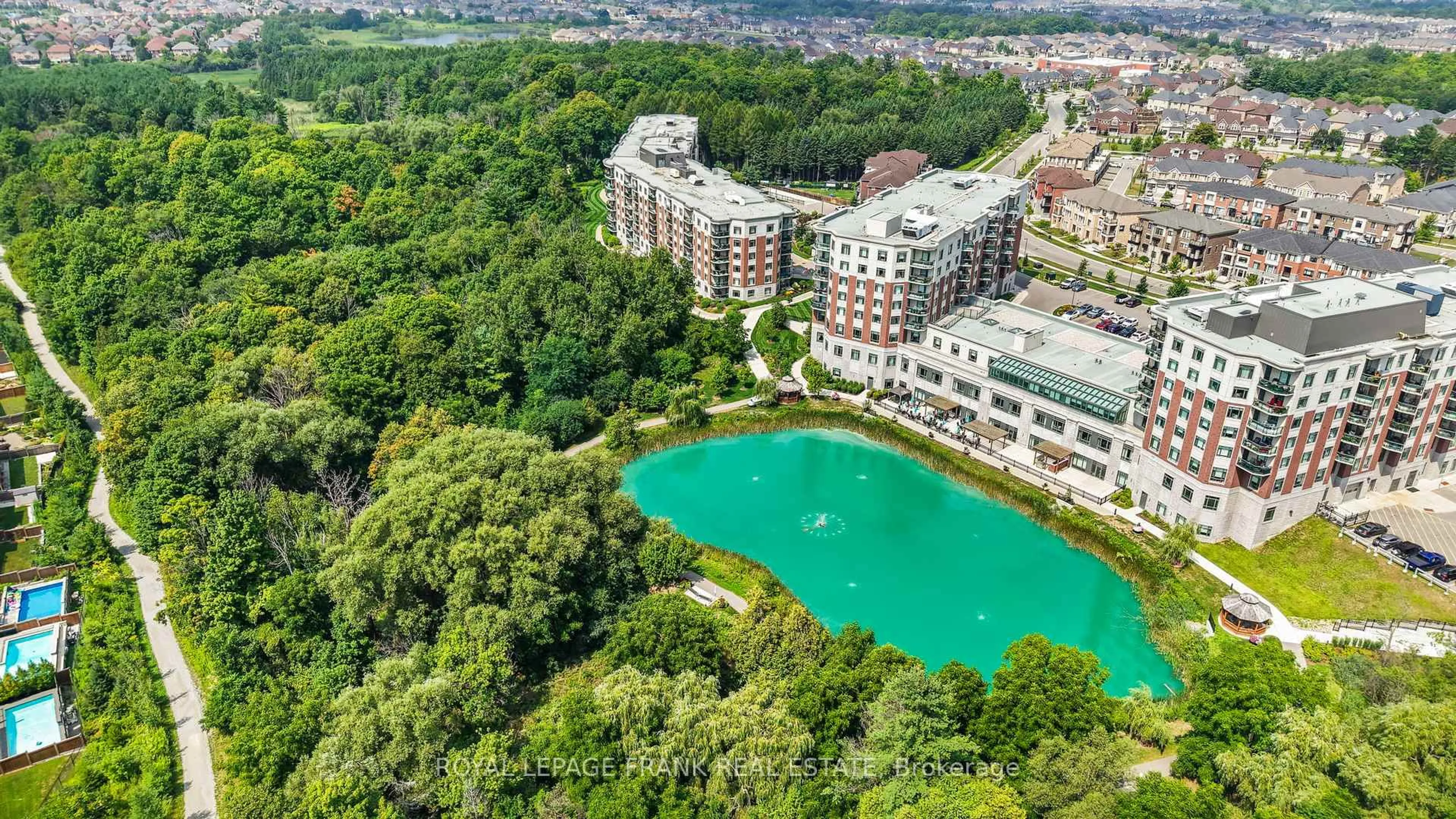 A pic from outside/outdoor area/front of a property/back of a property/a pic from drone, water/lake/river/ocean view for 420 William Graham Dr #320, Aurora Ontario L4G 1X4