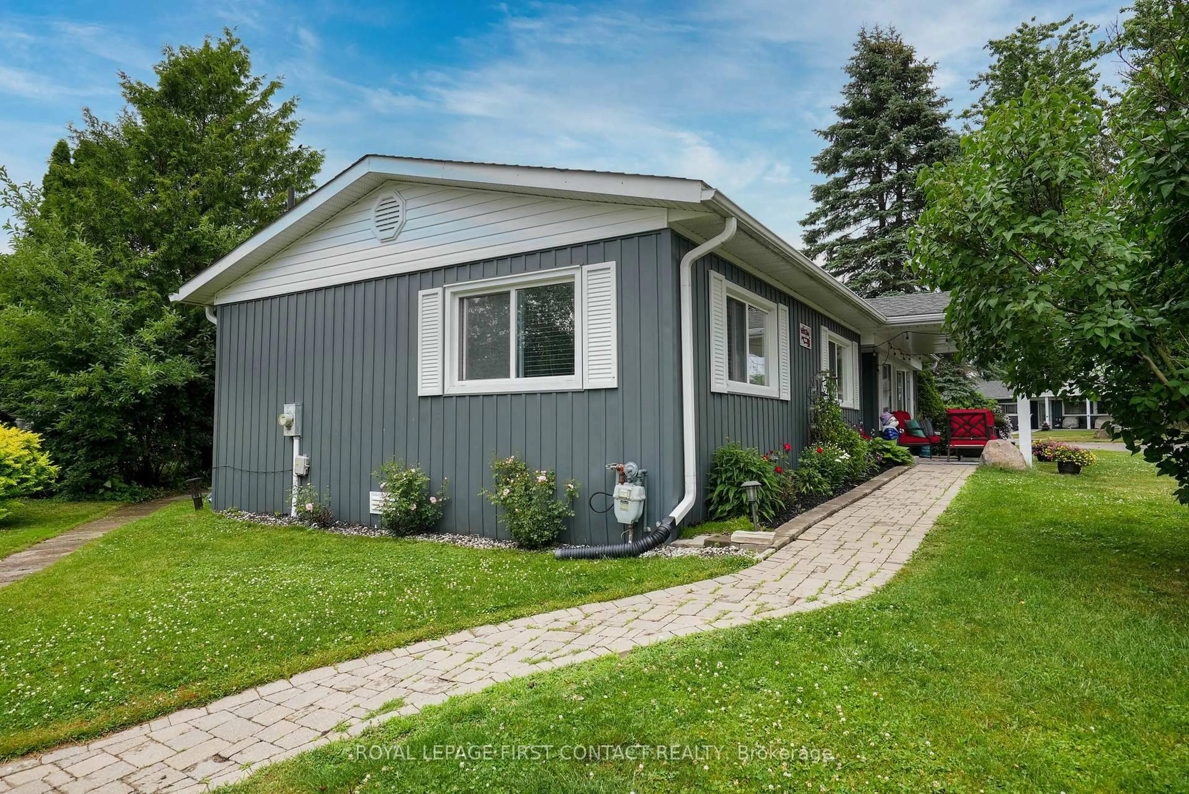 Home with vinyl exterior material, street for 2 Nature Tr, Innisfil Ontario L9S 1K7