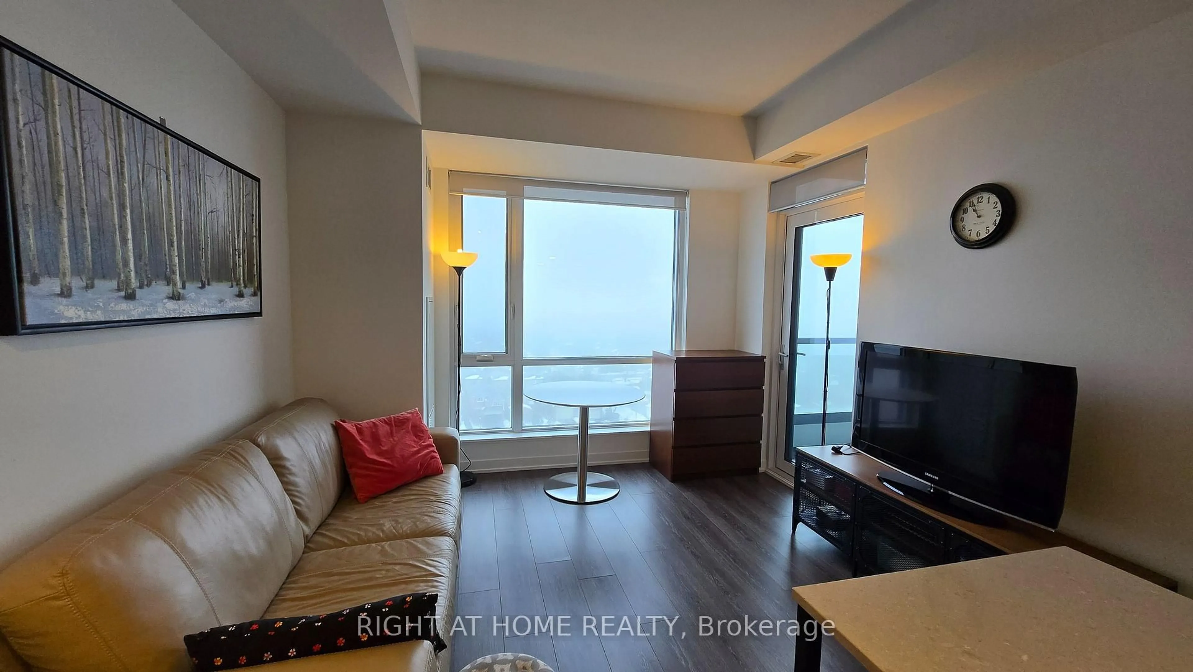 Living room with furniture, wood/laminate floor for 7950 Bathurst St #1008, Vaughan Ontario L4J 0L4
