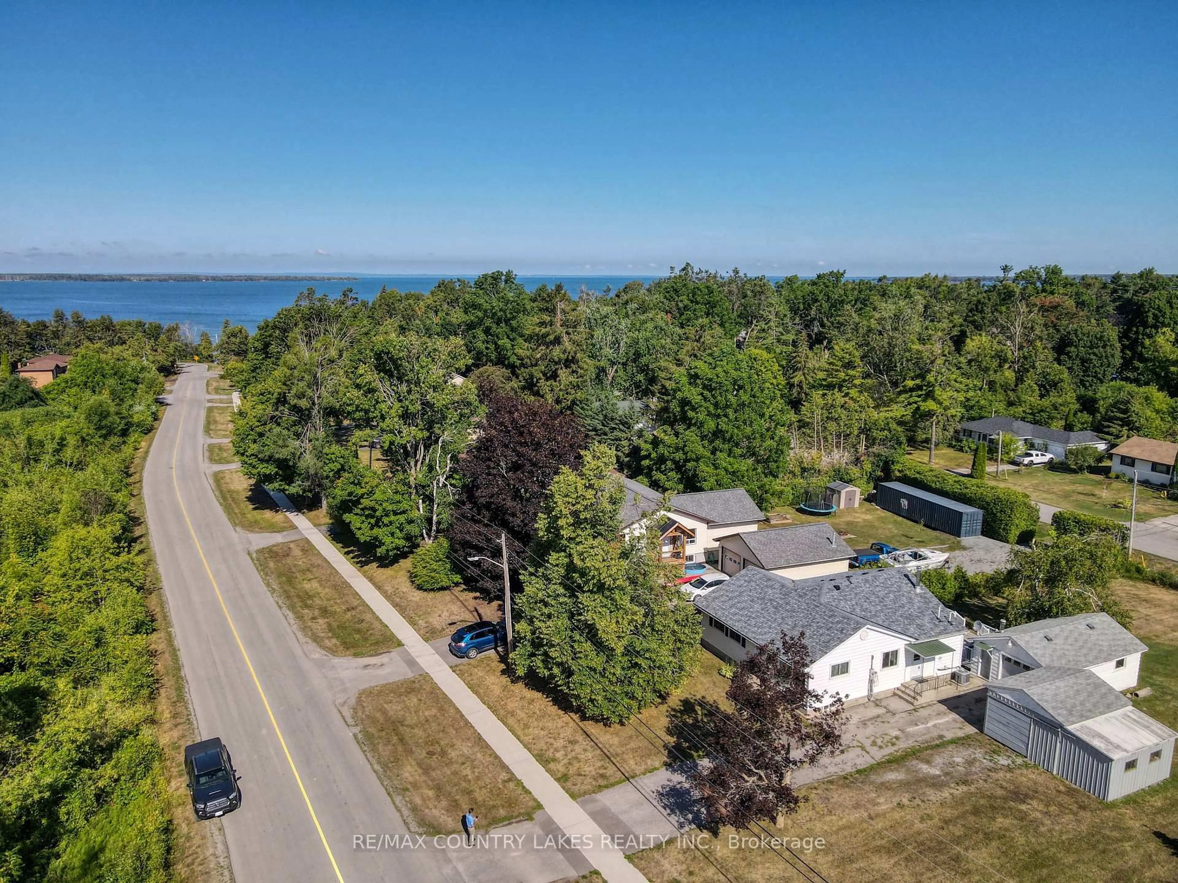 A pic from outside/outdoor area/front of a property/back of a property/a pic from drone, water/lake/river/ocean view for 122 Victoria Ave, Brock Ontario L0K 1A0