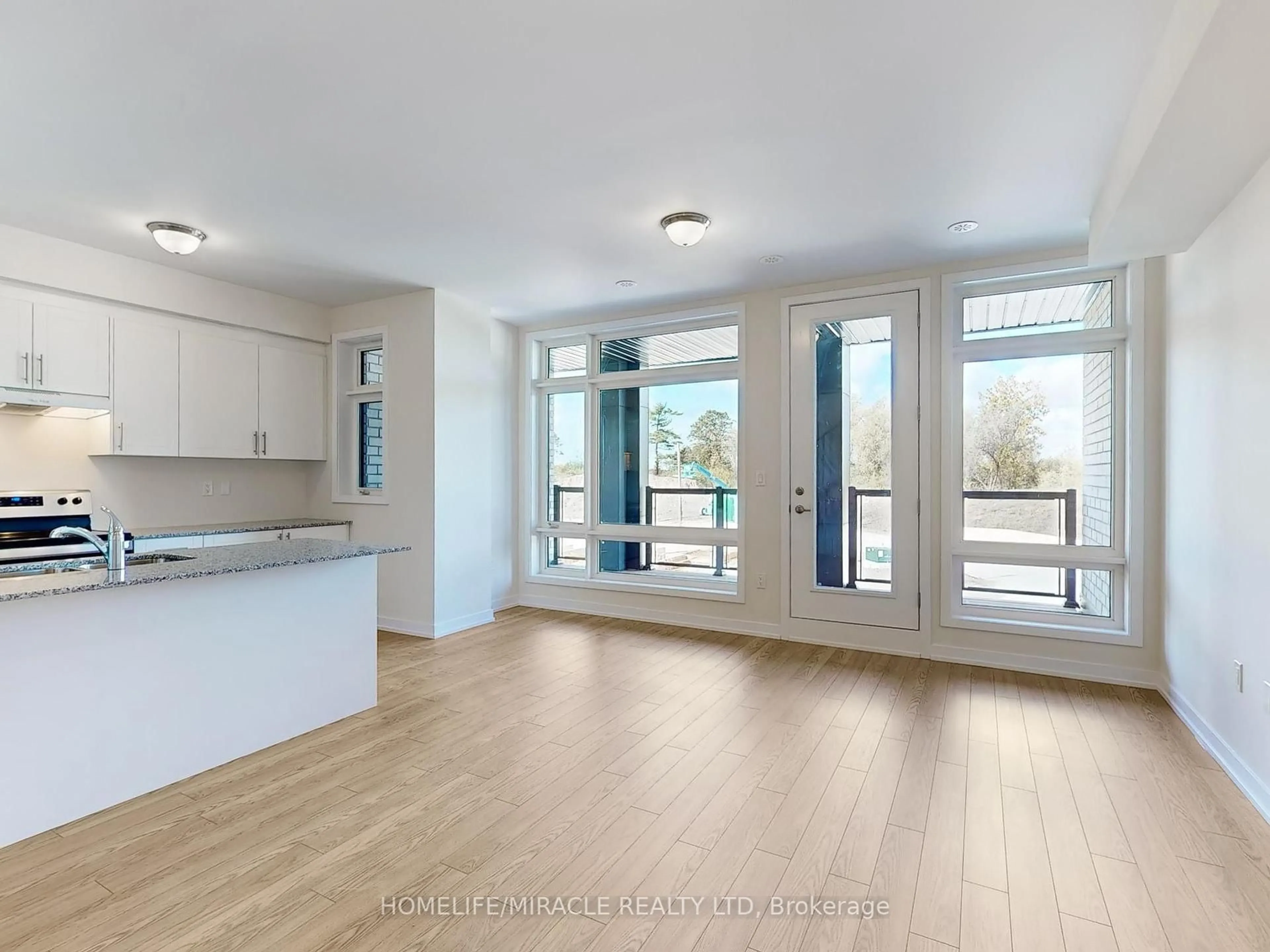 Open concept kitchen, wood/laminate floor for 41 Kintall Way, Vaughan Ontario L4L 0M6