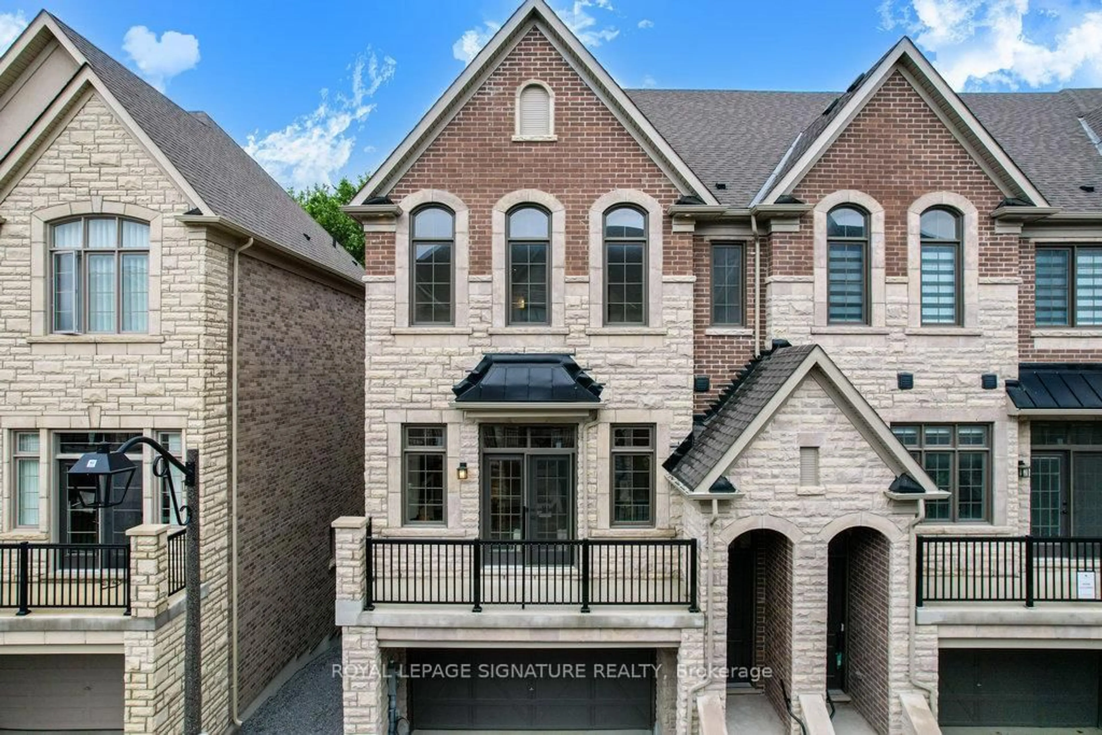 Home with brick exterior material, street for 80 West Village Lane, Markham Ontario L6C 3L5