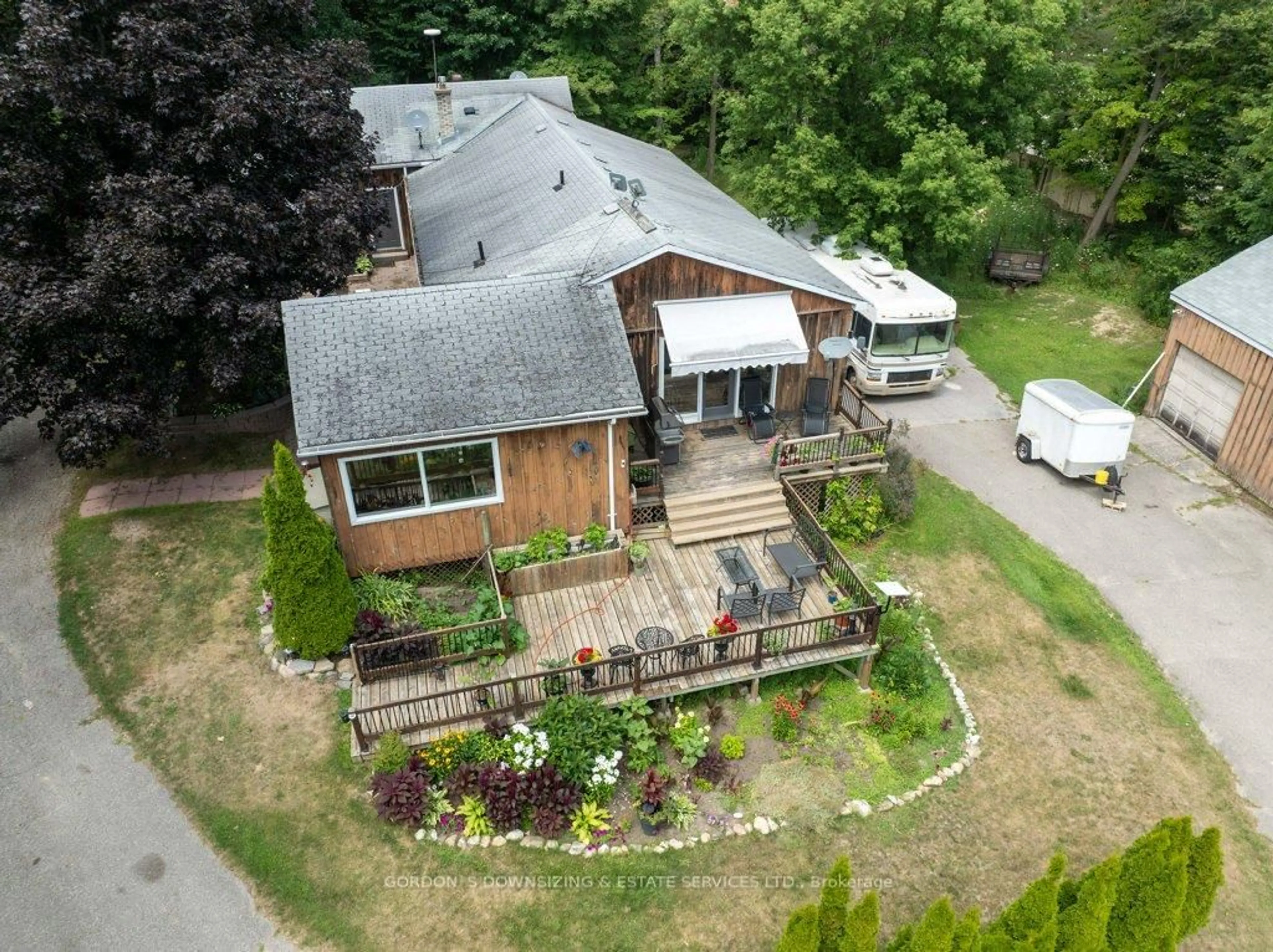 A pic from outside/outdoor area/front of a property/back of a property/a pic from drone, street for 8708 Highway 9 Highway, New Tecumseth Ontario L0G 1W0