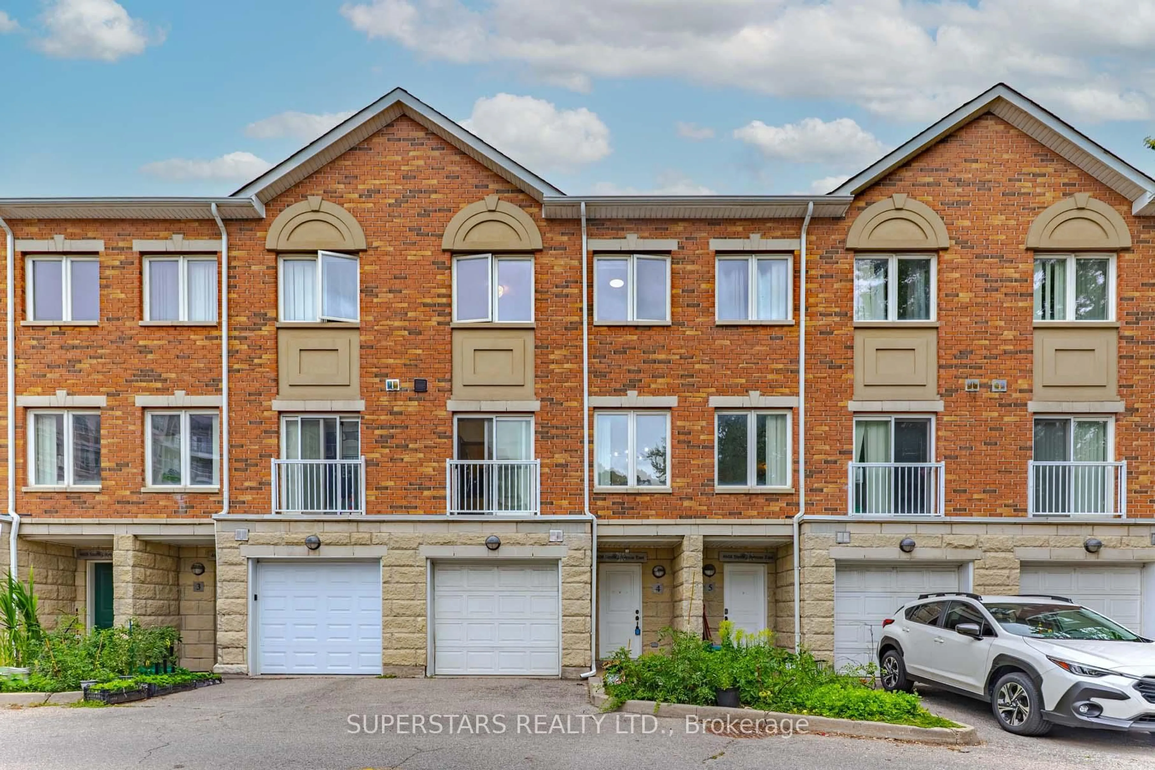 A pic from outside/outdoor area/front of a property/back of a property/a pic from drone, street for 4608 Steeles Ave #TH4, Markham Ontario L3R 6B6