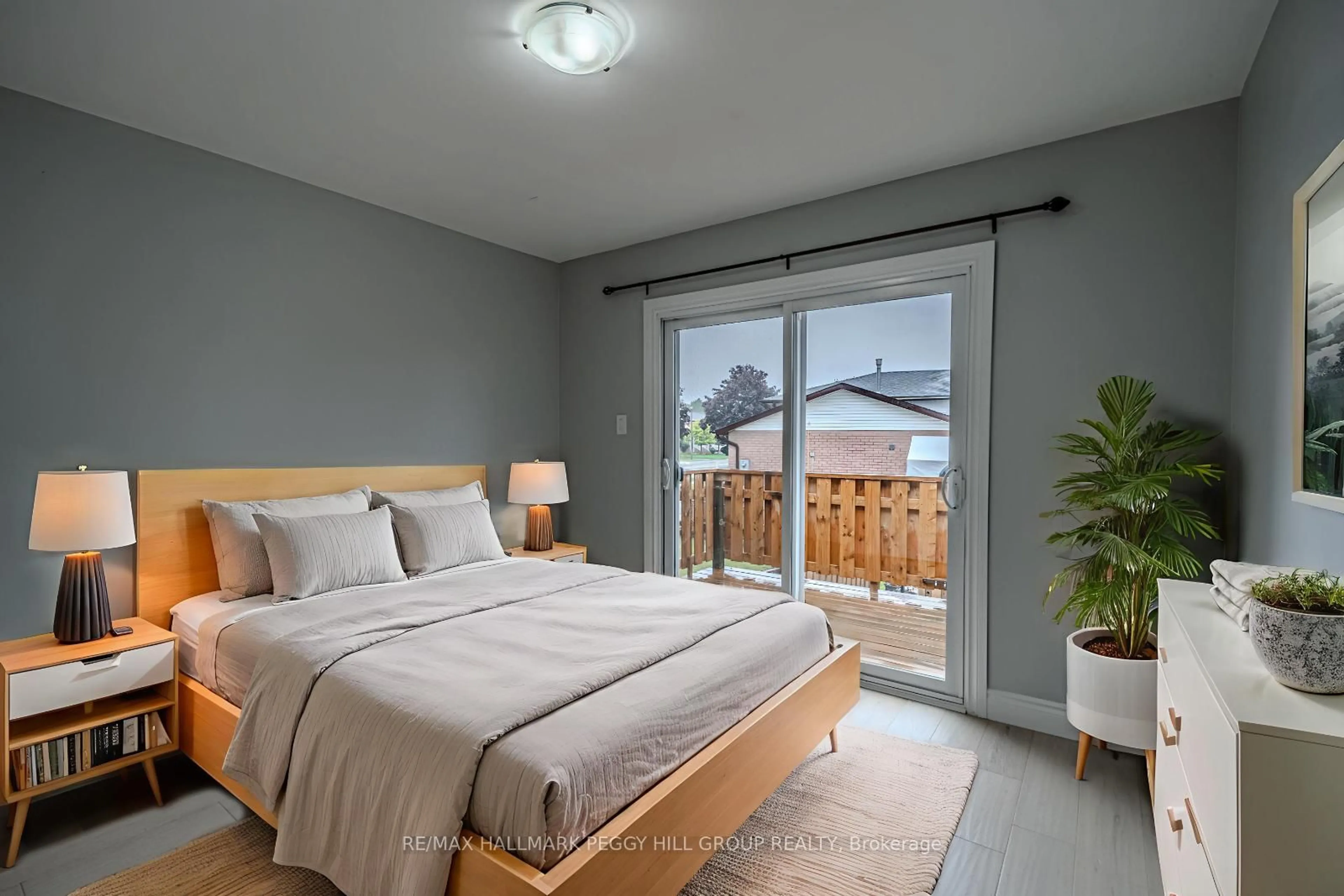 Bedroom with bed, wood/laminate floor for 388 Parkwood Ave, Bradford West Gwillimbury Ontario L3Z 2W9