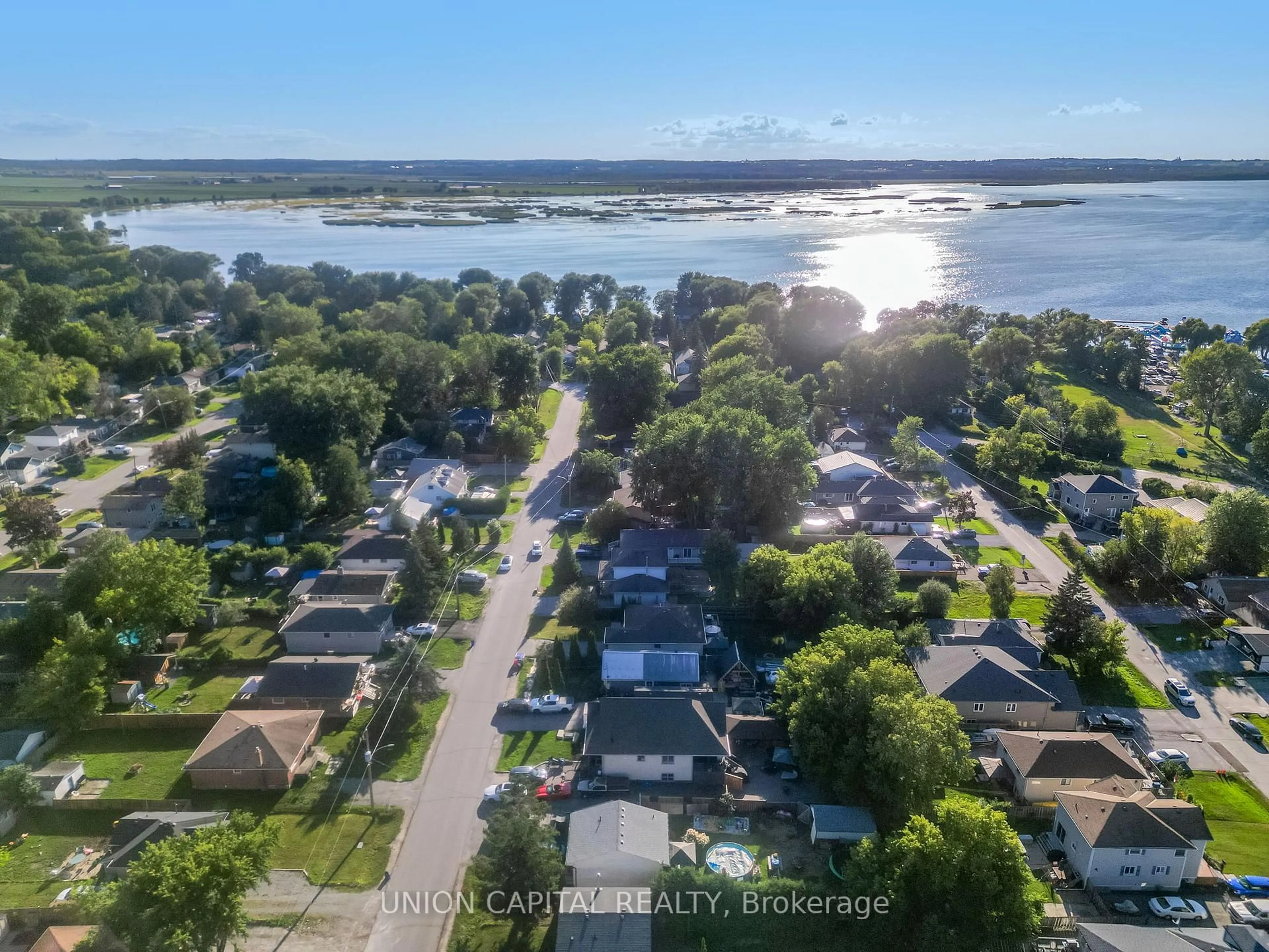 A pic from outside/outdoor area/front of a property/back of a property/a pic from drone, water/lake/river/ocean view for 350 Hollywood Dr, Georgina Ontario L4P 3A1