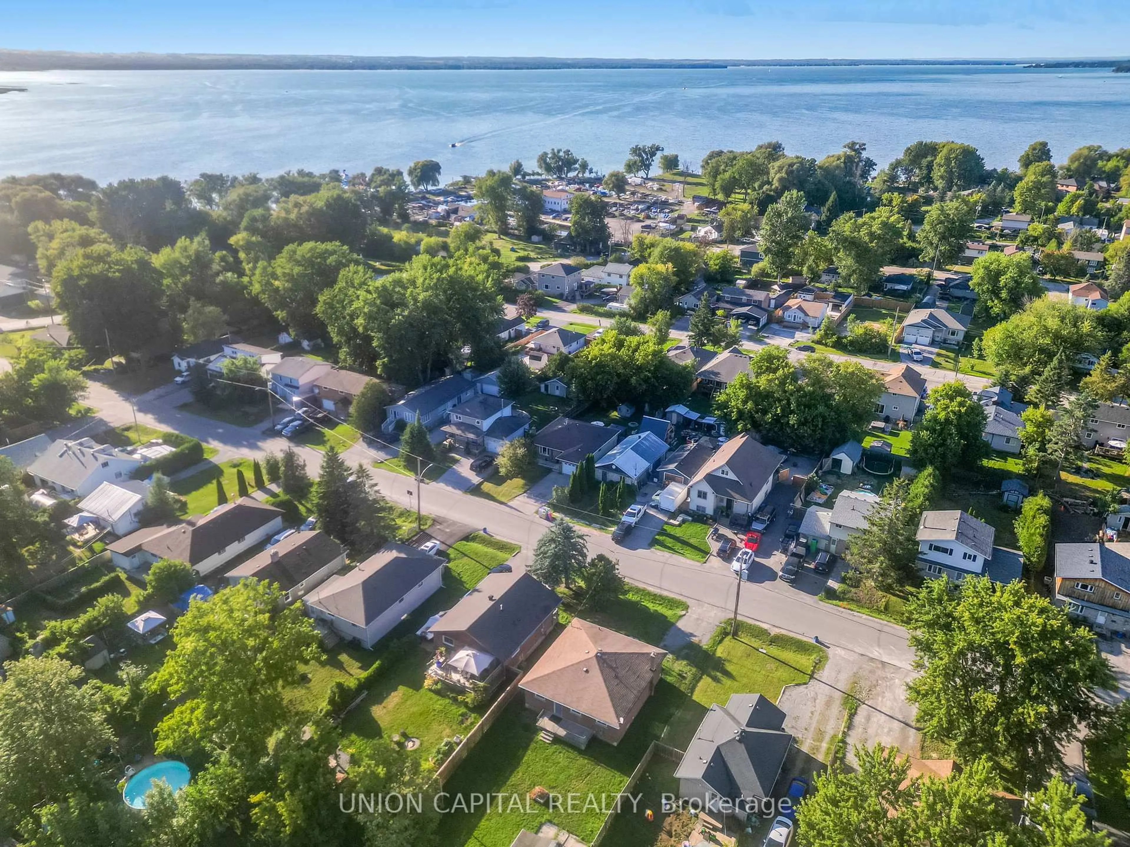 A pic from outside/outdoor area/front of a property/back of a property/a pic from drone, water/lake/river/ocean view for 350 Hollywood Dr, Georgina Ontario L4P 3A1
