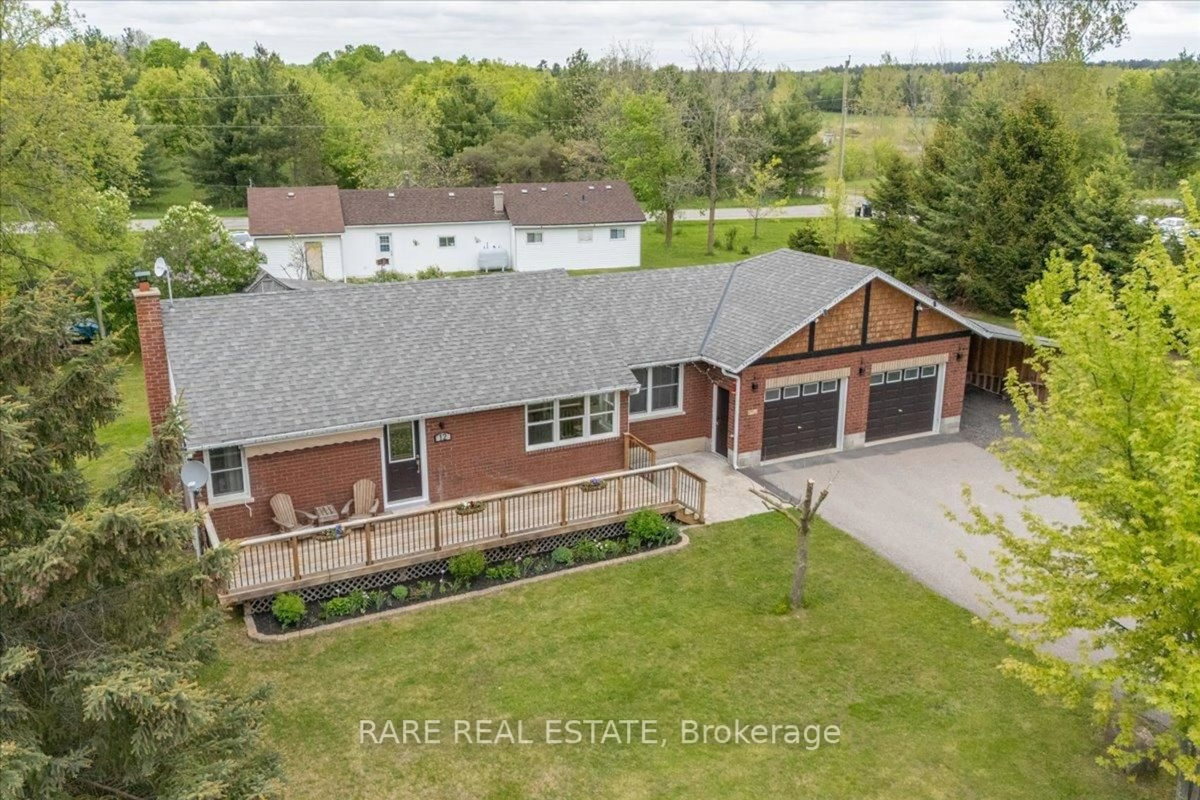 A pic from outside/outdoor area/front of a property/back of a property/a pic from drone, water/lake/river/ocean view for 12 Evan Ave, Adjala-Tosorontio Ontario L0M 1K0