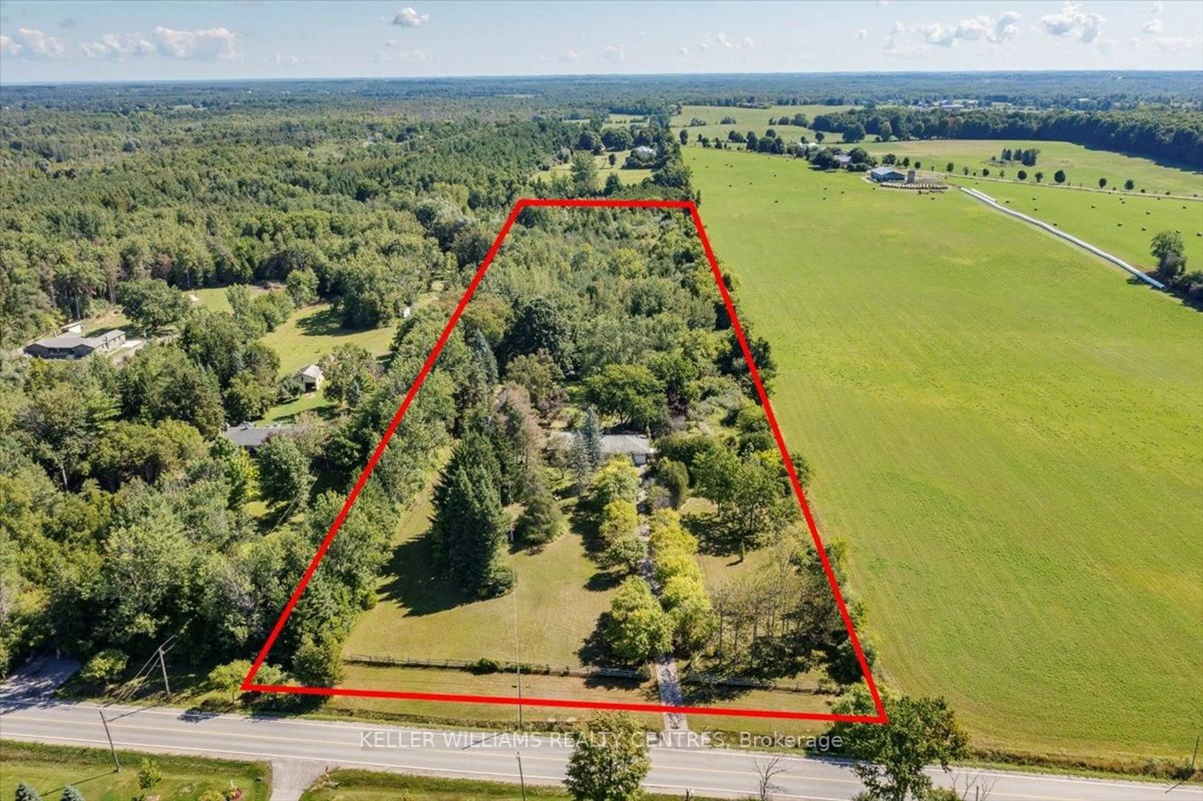 A pic from outside/outdoor area/front of a property/back of a property/a pic from drone, unknown for 23973 Kennedy Rd, Georgina Ontario L0E 1R0
