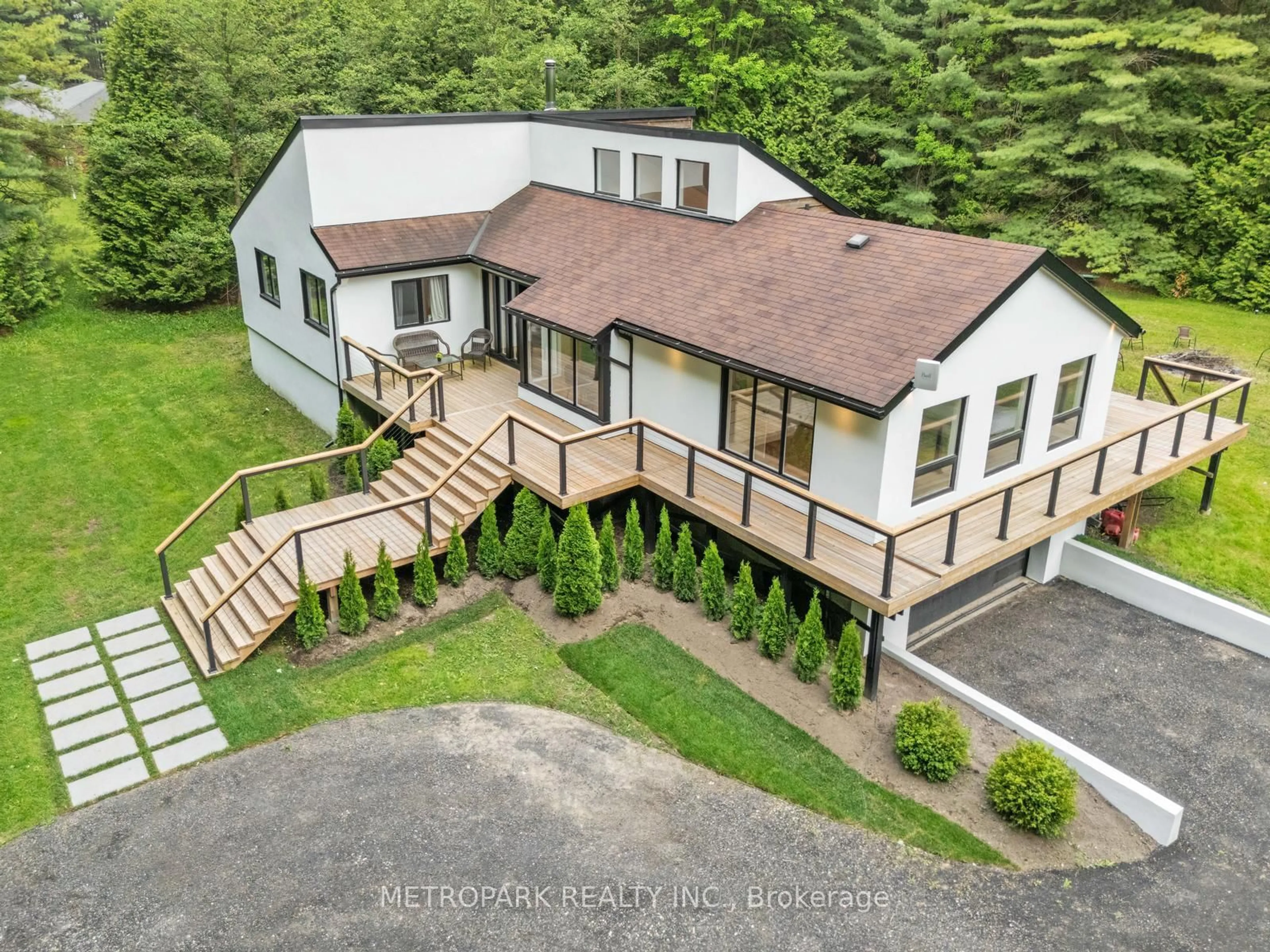 A pic from outside/outdoor area/front of a property/back of a property/a pic from drone, mountain view for 6500 County Road 10, Essa Ontario L9R 1V2