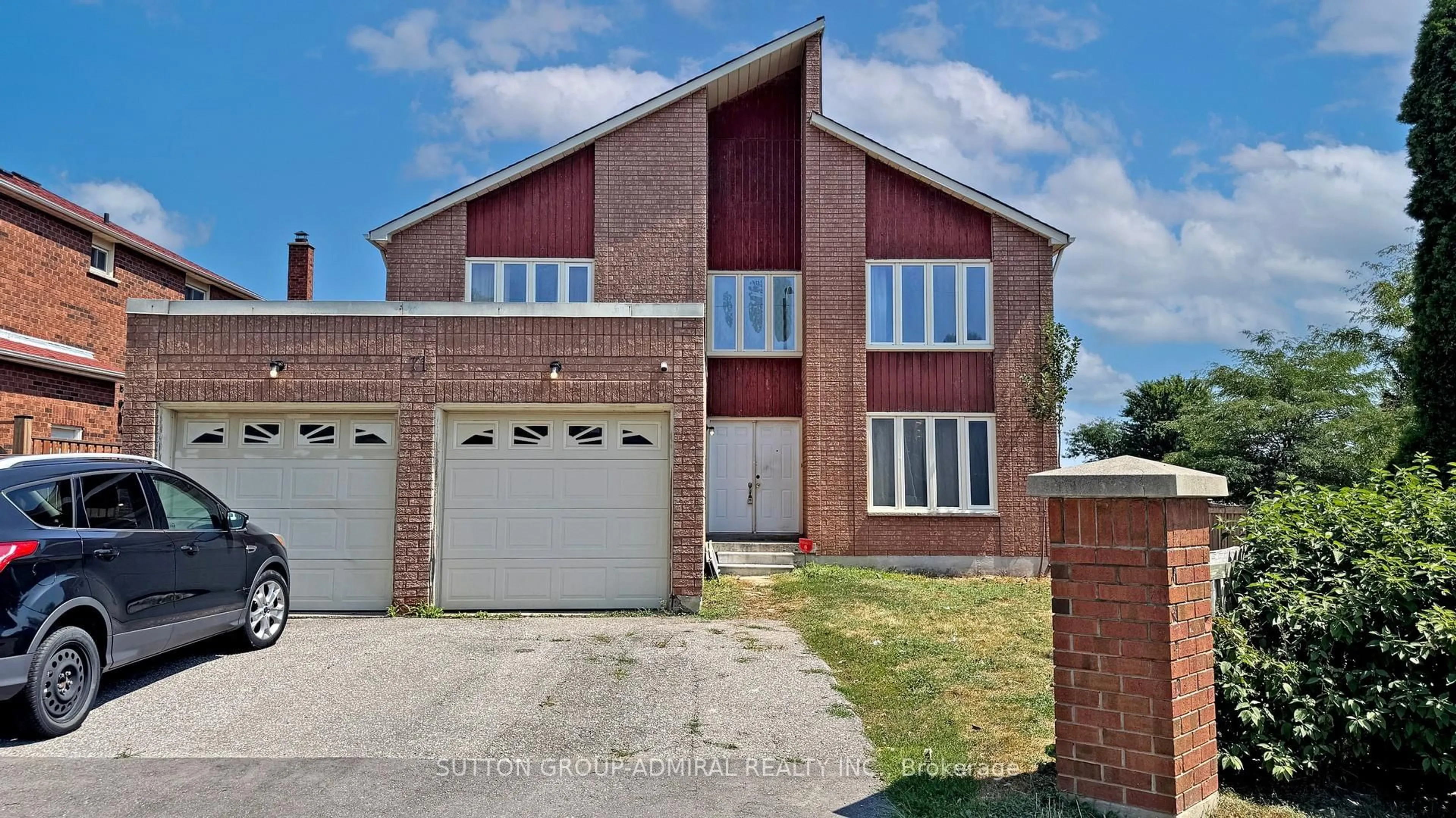Home with brick exterior material, street for 71 Featherstone Ave, Markham Ontario L3S 3G8