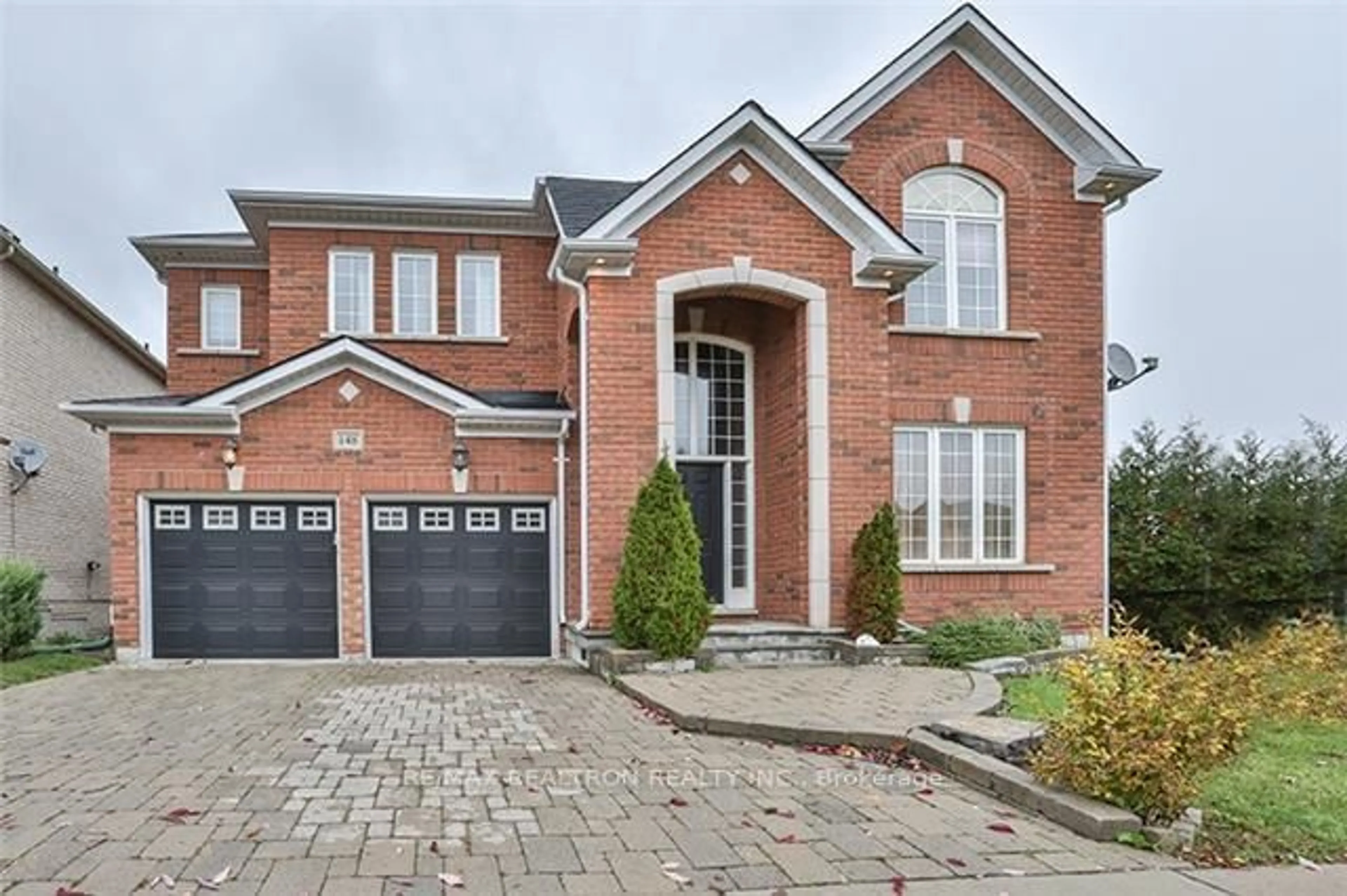 Home with brick exterior material, street for 148 Tower Hill Rd, Richmond Hill Ontario L4E 4L9