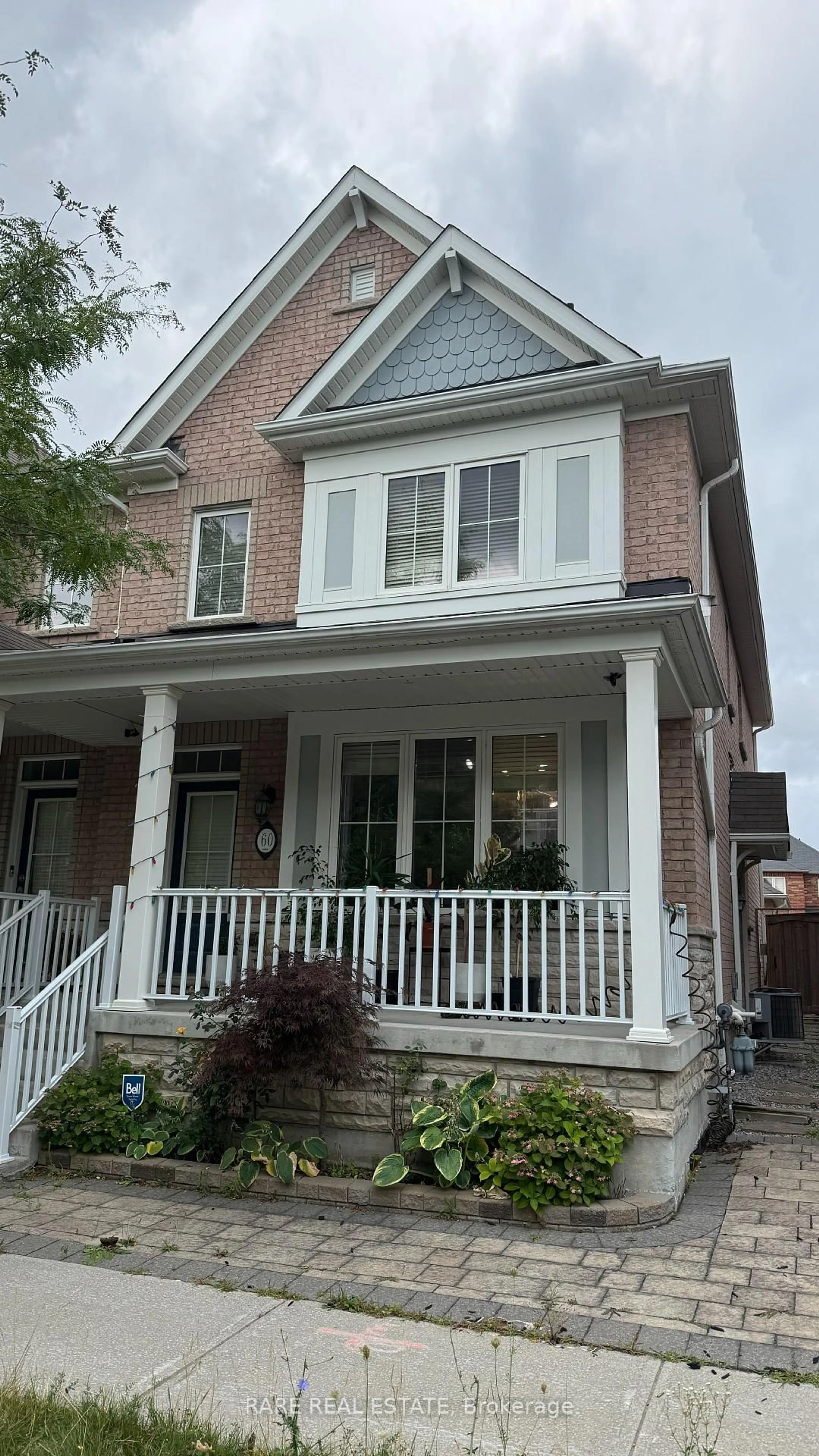 Home with brick exterior material, street for 60 Bittersweet St, Markham Ontario L6B 1C9