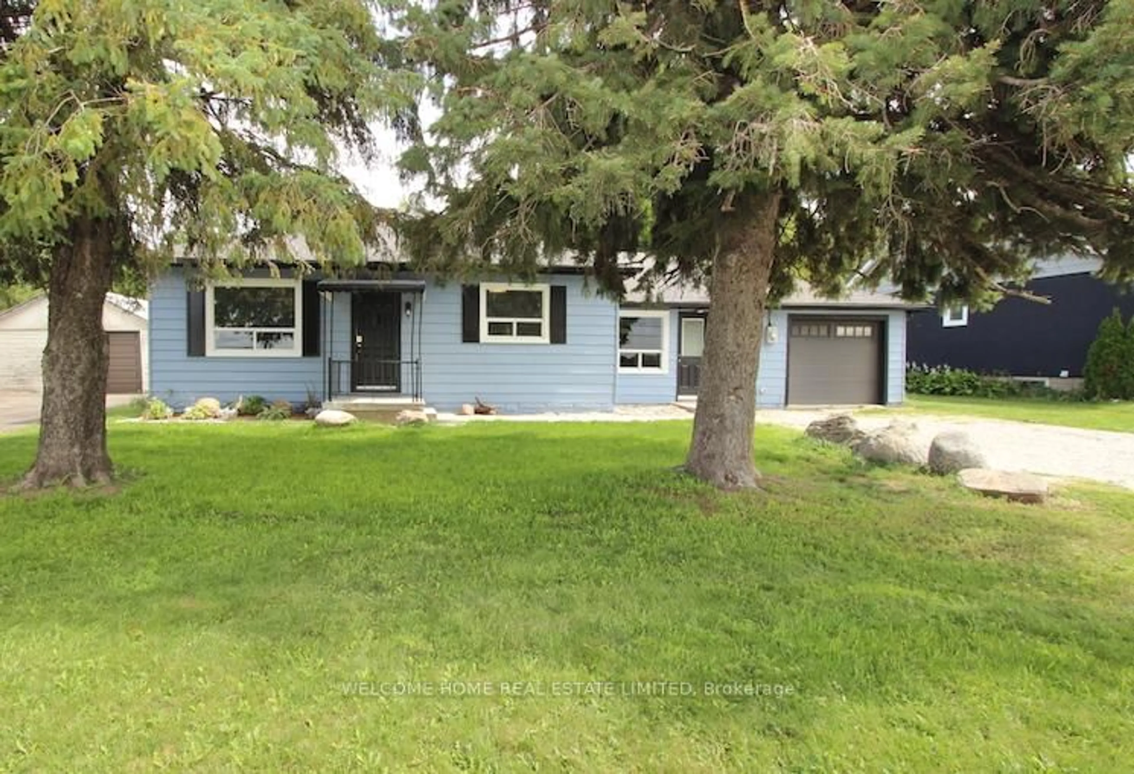 Home with vinyl exterior material, street for 145 King St, New Tecumseth Ontario L9R 1N7