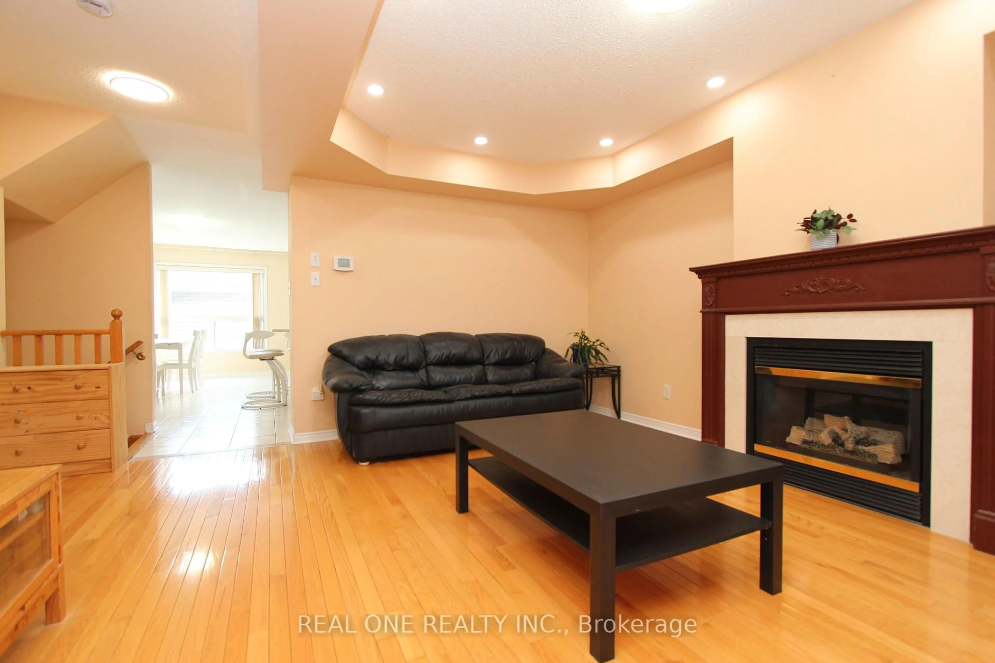 Living room with furniture, wood/laminate floor for 51 Forest Run Blvd, Vaughan Ontario L4K 5J7