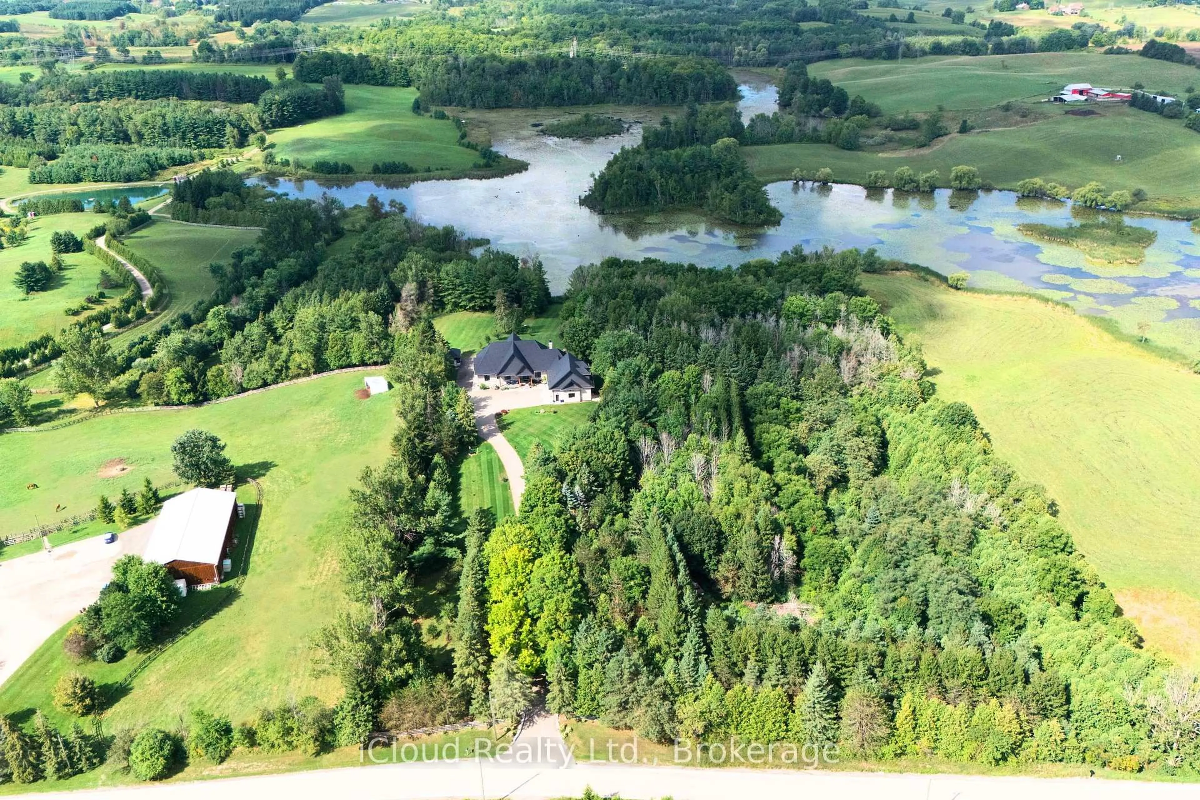 A pic from outside/outdoor area/front of a property/back of a property/a pic from drone, water/lake/river/ocean view for 15670 10th Concession Rd, King Ontario L0G 1T0