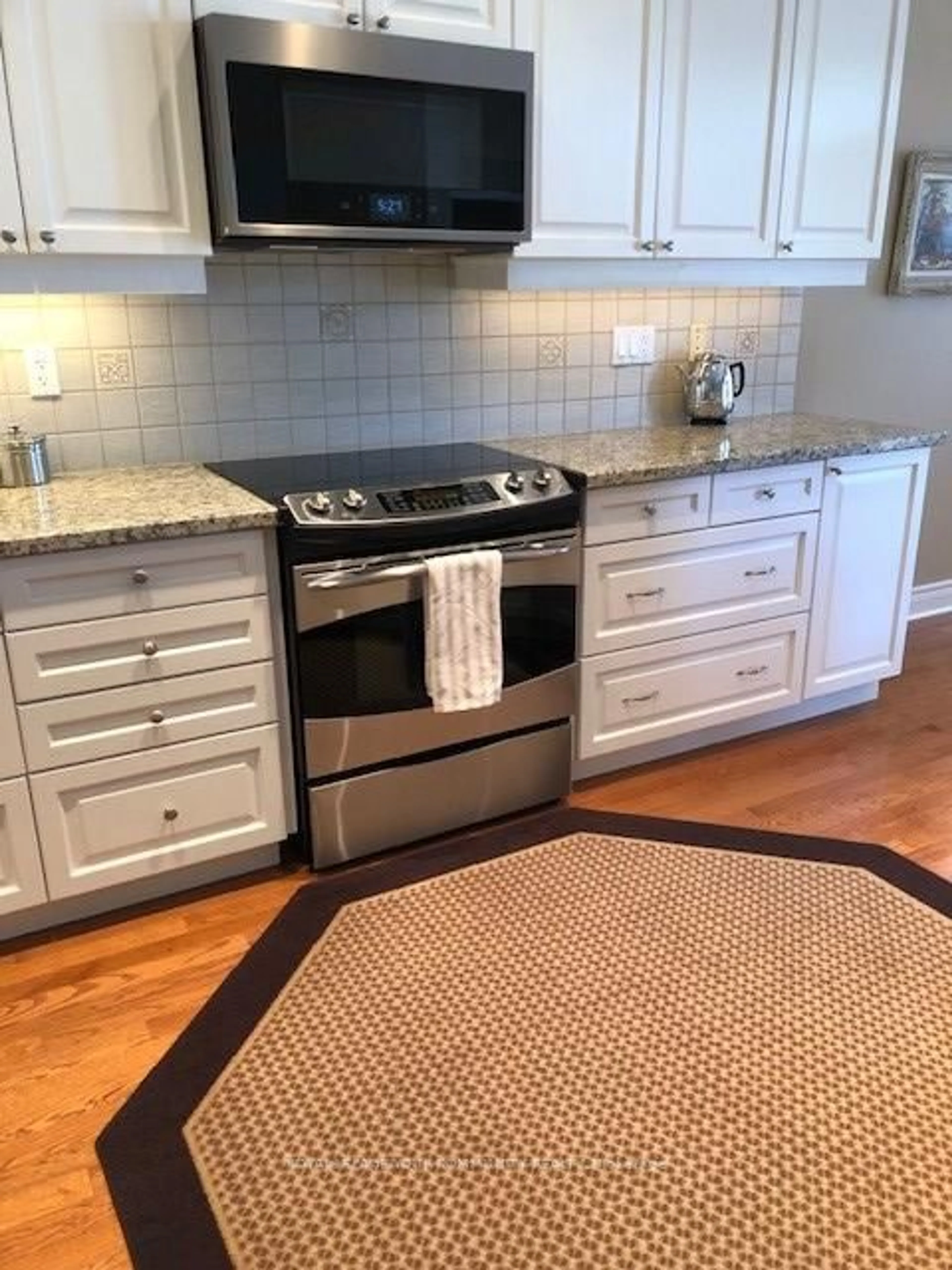 Open concept kitchen, ceramic/tile floor for 303 BABE'S Way, Whitchurch-Stouffville Ontario L4A 0K5