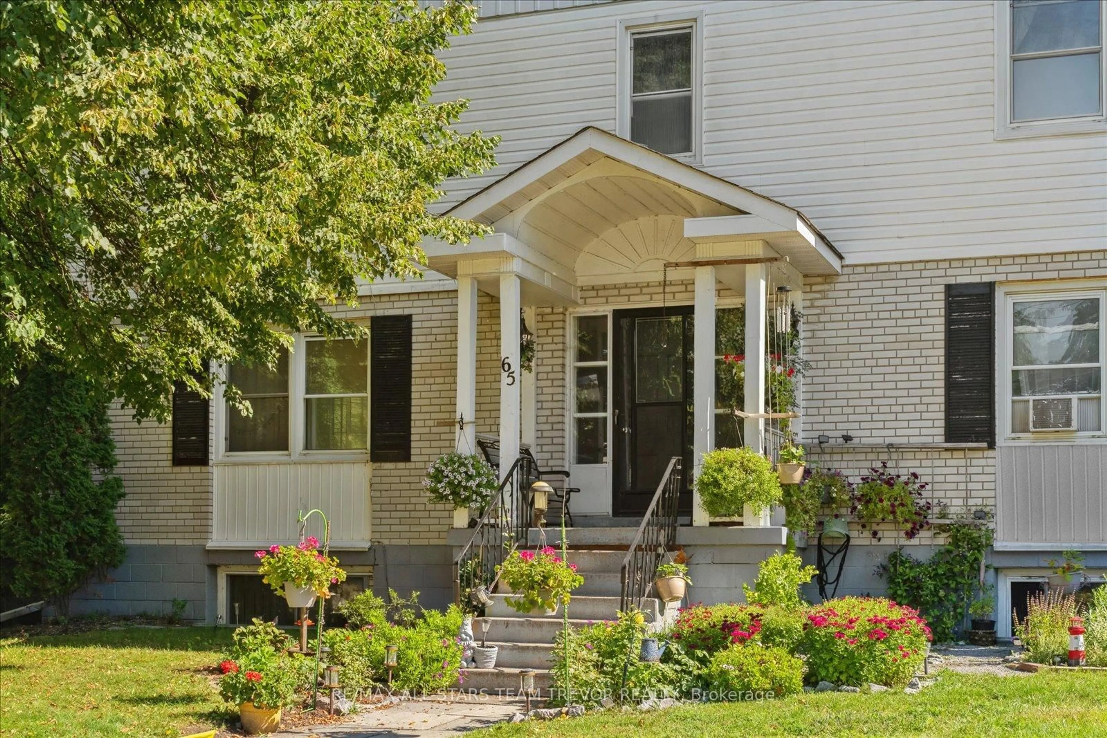 Home with brick exterior material, street for 65 High St, Georgina Ontario L0E 1R0
