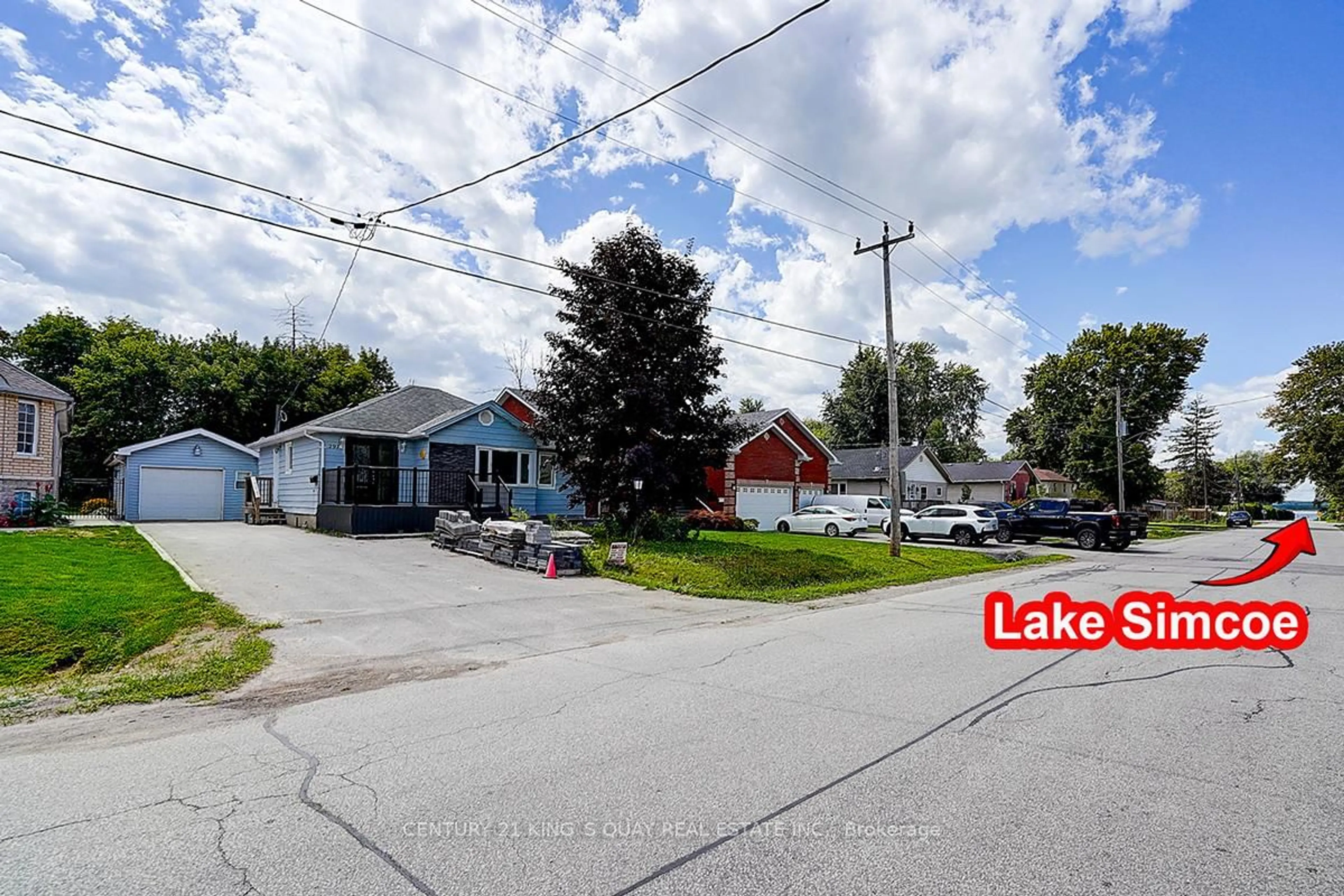 A pic from outside/outdoor area/front of a property/back of a property/a pic from drone, street for 297 Glenwoods Ave, Georgina Ontario L4P 2X1